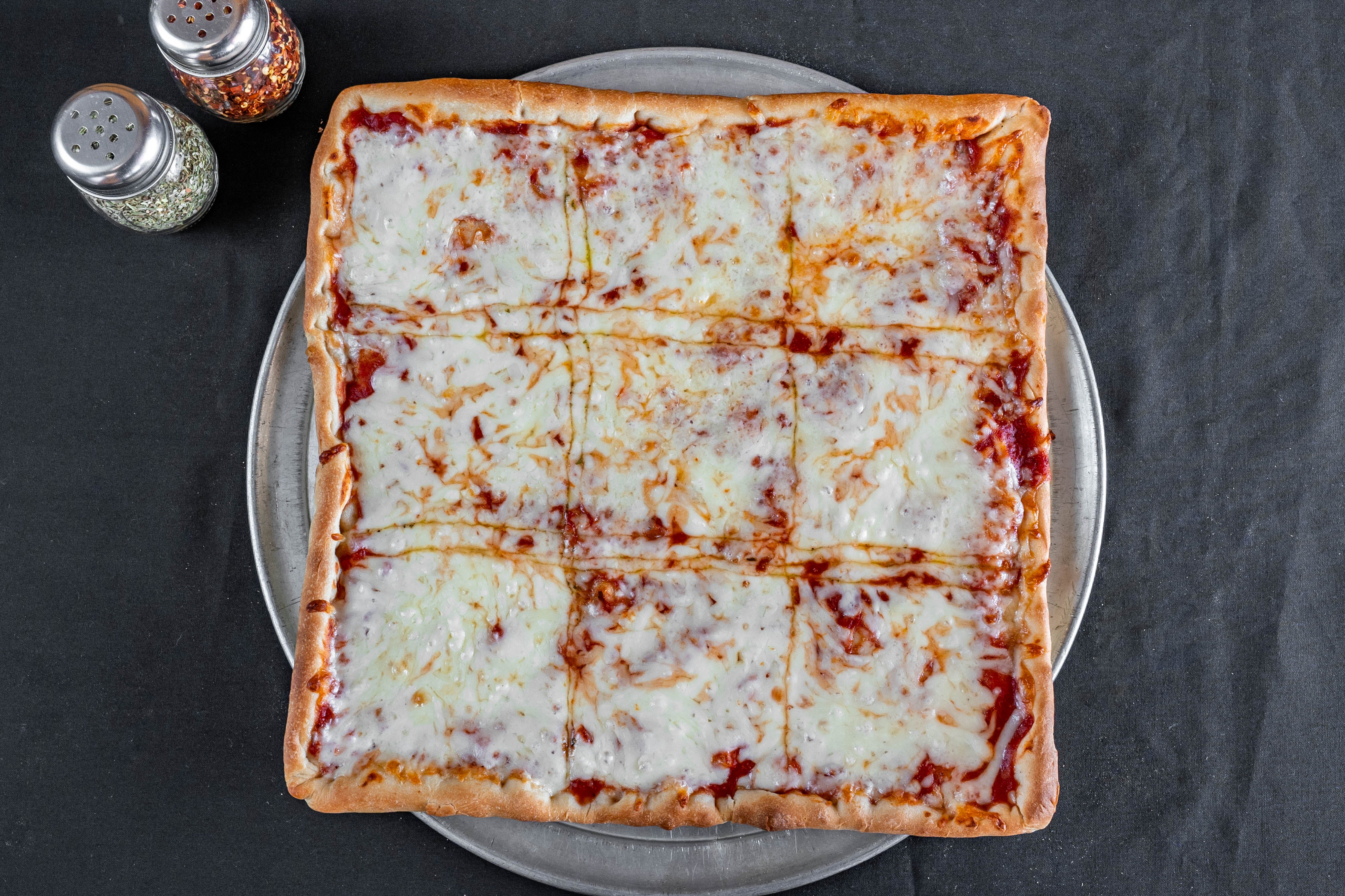 Order Sicilian Cheese Pizza - Square food online from Nicos Pizza store, New Britain on bringmethat.com
