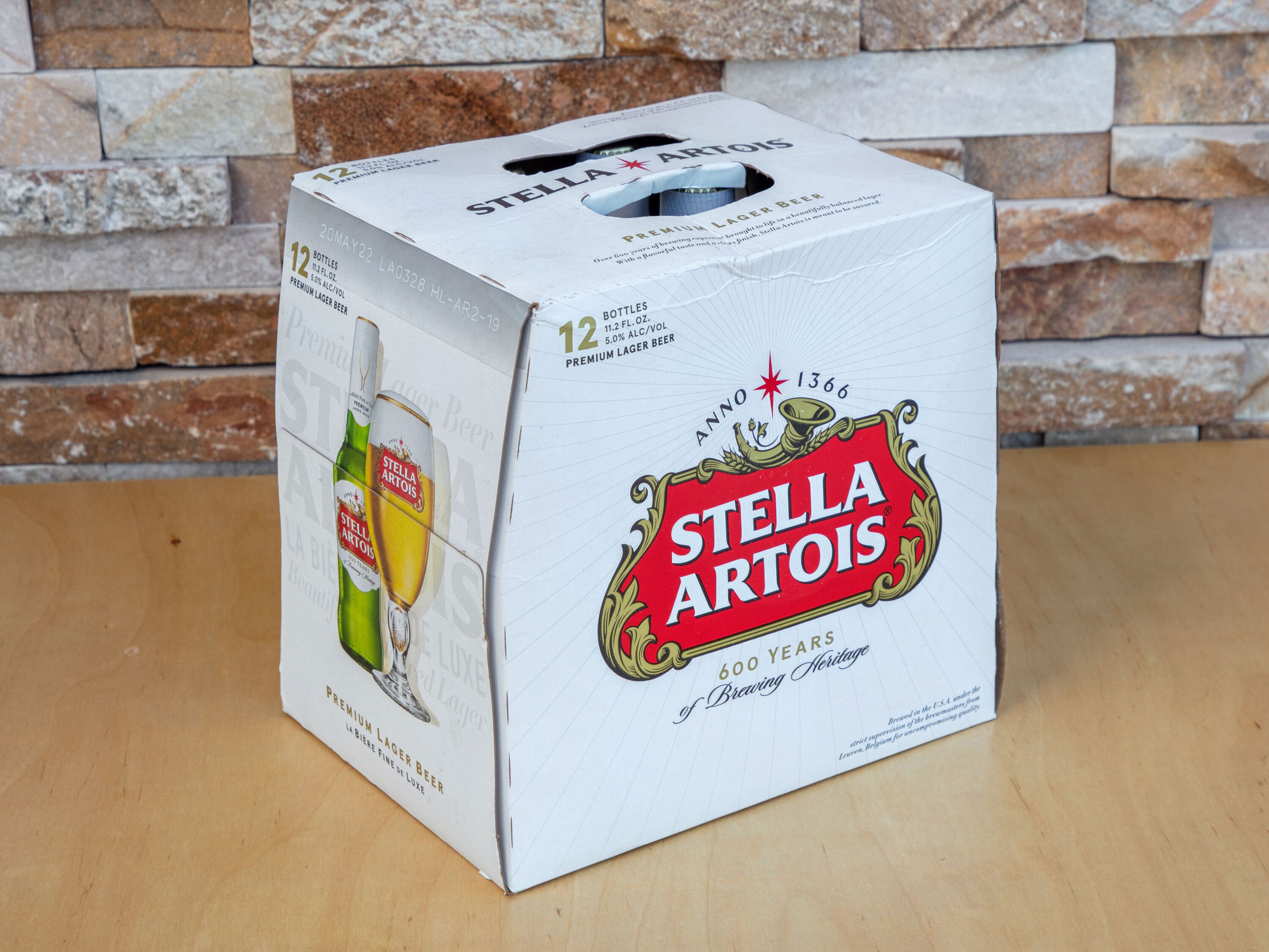 Order 12 Bottled Stella Artois food online from Sk Food Mart store, Mesa on bringmethat.com