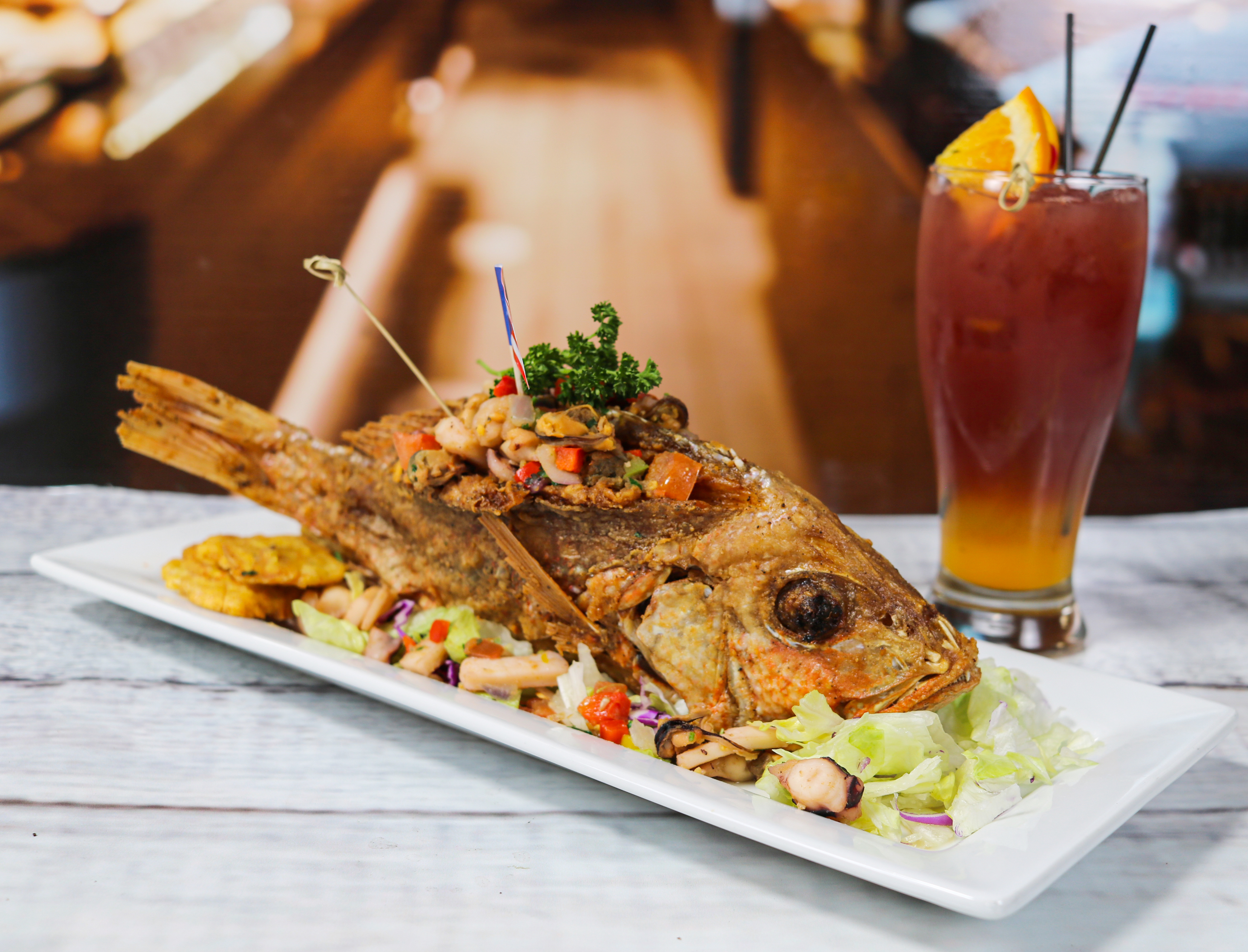 Order Red Snapper Deluxe / Chillo Relleno food online from Condado Bar store, Rochester on bringmethat.com