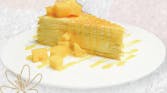 Order Mango Milk Crepe Cake food online from Sweet Room store, Cary on bringmethat.com
