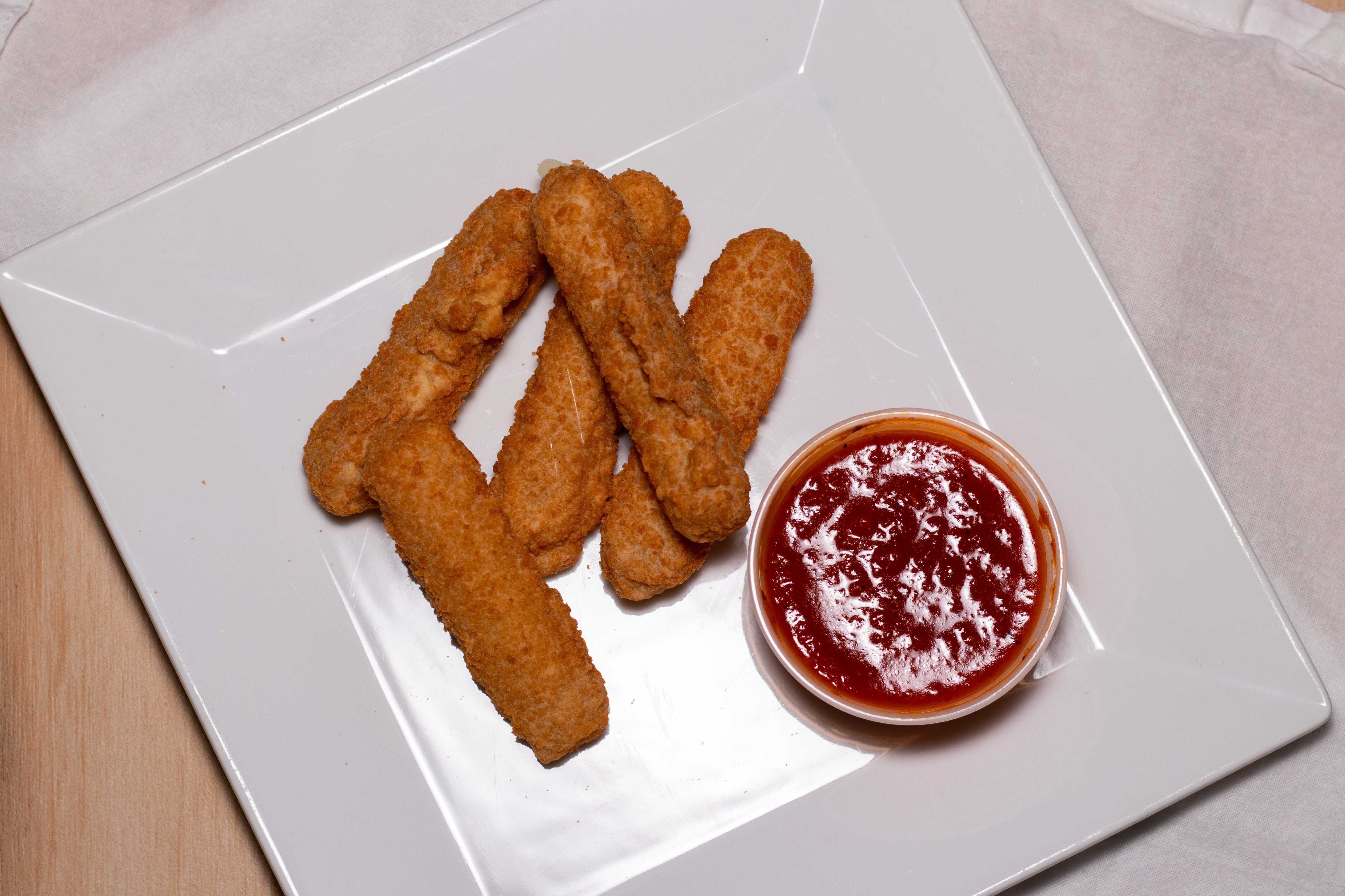Order 10 Mozzarella Sticks food online from Charlies Pizza Cafe store, Allston on bringmethat.com