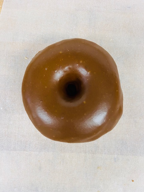 Order Chocolate Round Donut food online from Highland Donuts store, Bakersfield on bringmethat.com