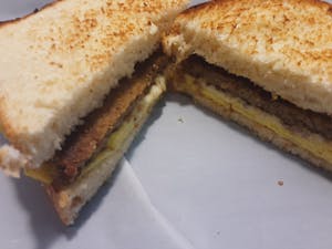 Order SCRAPPLE EGG AND CHEESE ON TOAST food online from Millers Country Kitchen store, Middletown on bringmethat.com