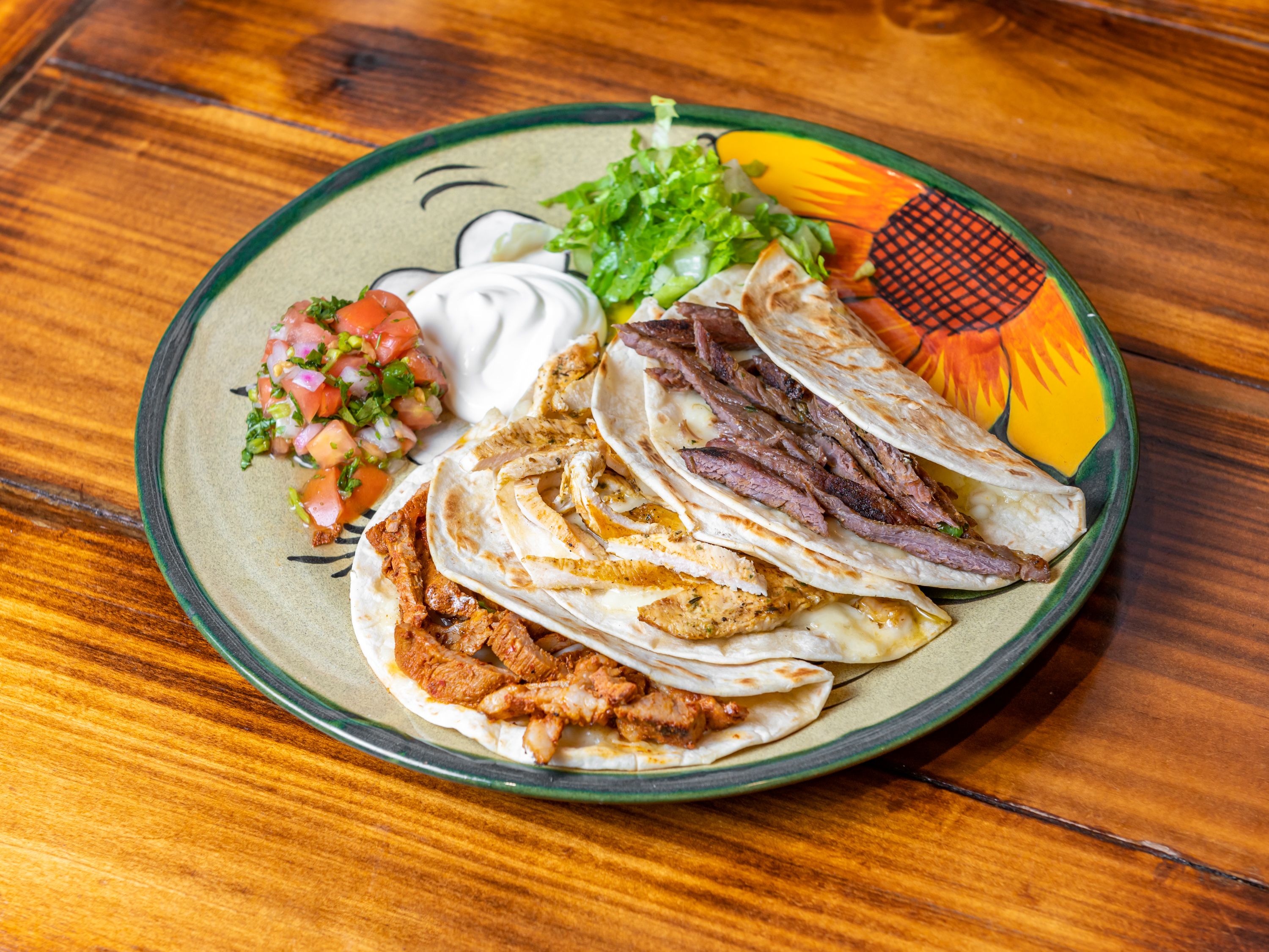 Order Grilled Chicken Quesadillas food online from El Paso Taqueria store, New York on bringmethat.com