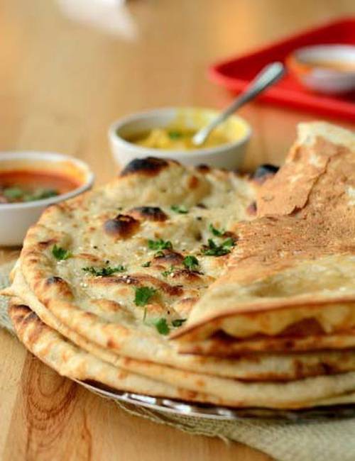 Order Garlic Naan food online from Bawarchi Indian Grill & Bar store, Concord on bringmethat.com
