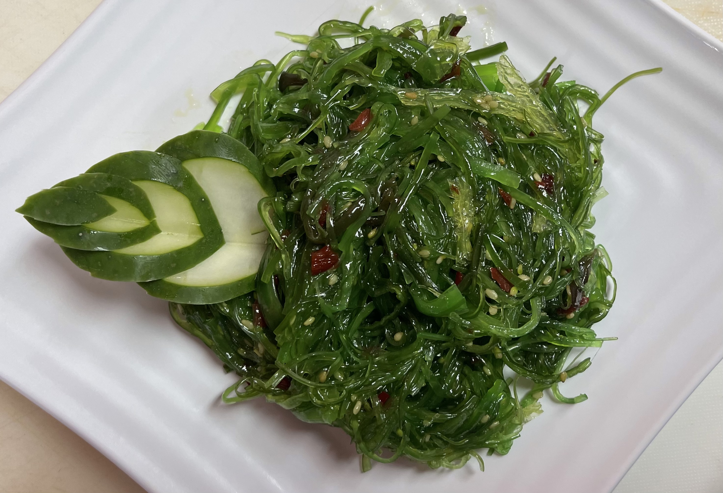 Order Seaweed Salad food online from Sushi Go store, Dallas on bringmethat.com