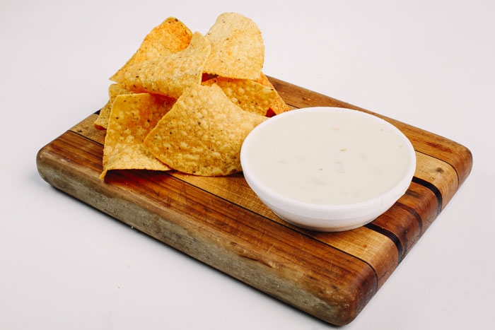 Order Chip & Queso food online from Yabos Tacos store, Hilliard on bringmethat.com