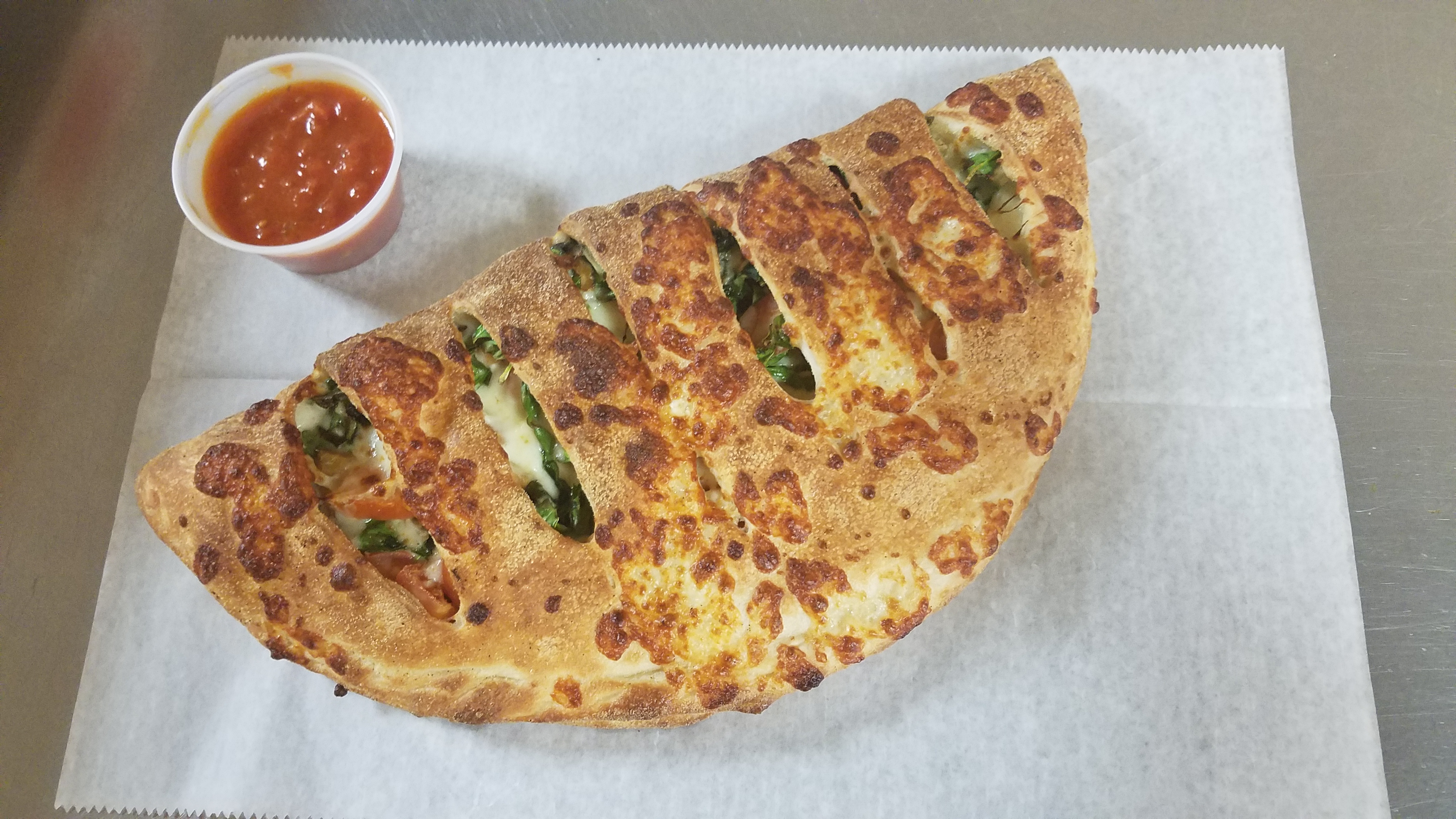 Order Chicken Broccoli Calzone food online from Gregory House Of Pizza store, Belmont on bringmethat.com