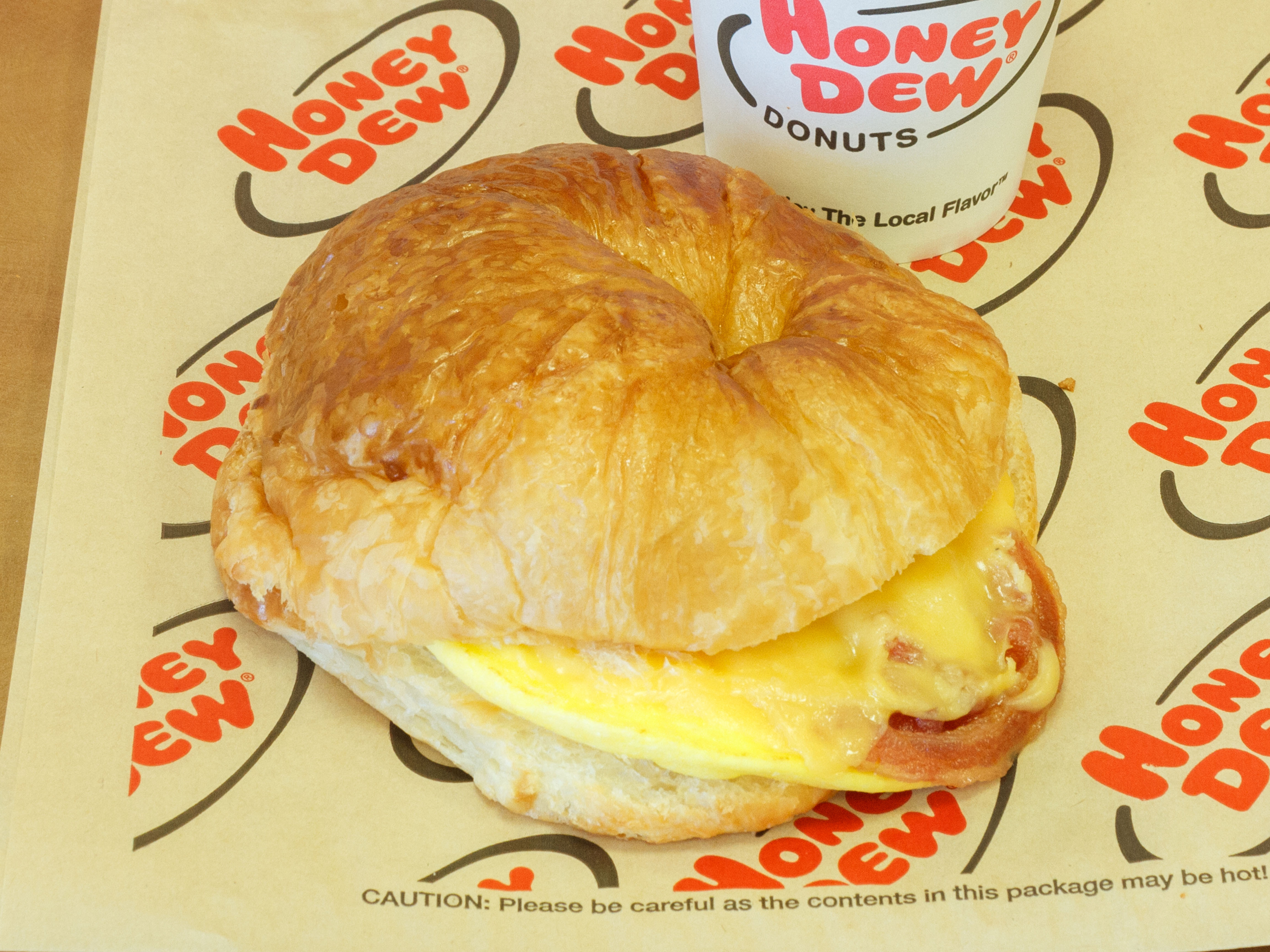 Order 7.  Meat, Egg and Cheese on a Croissant Combo food online from Honey Dew Donuts store, Danvers on bringmethat.com