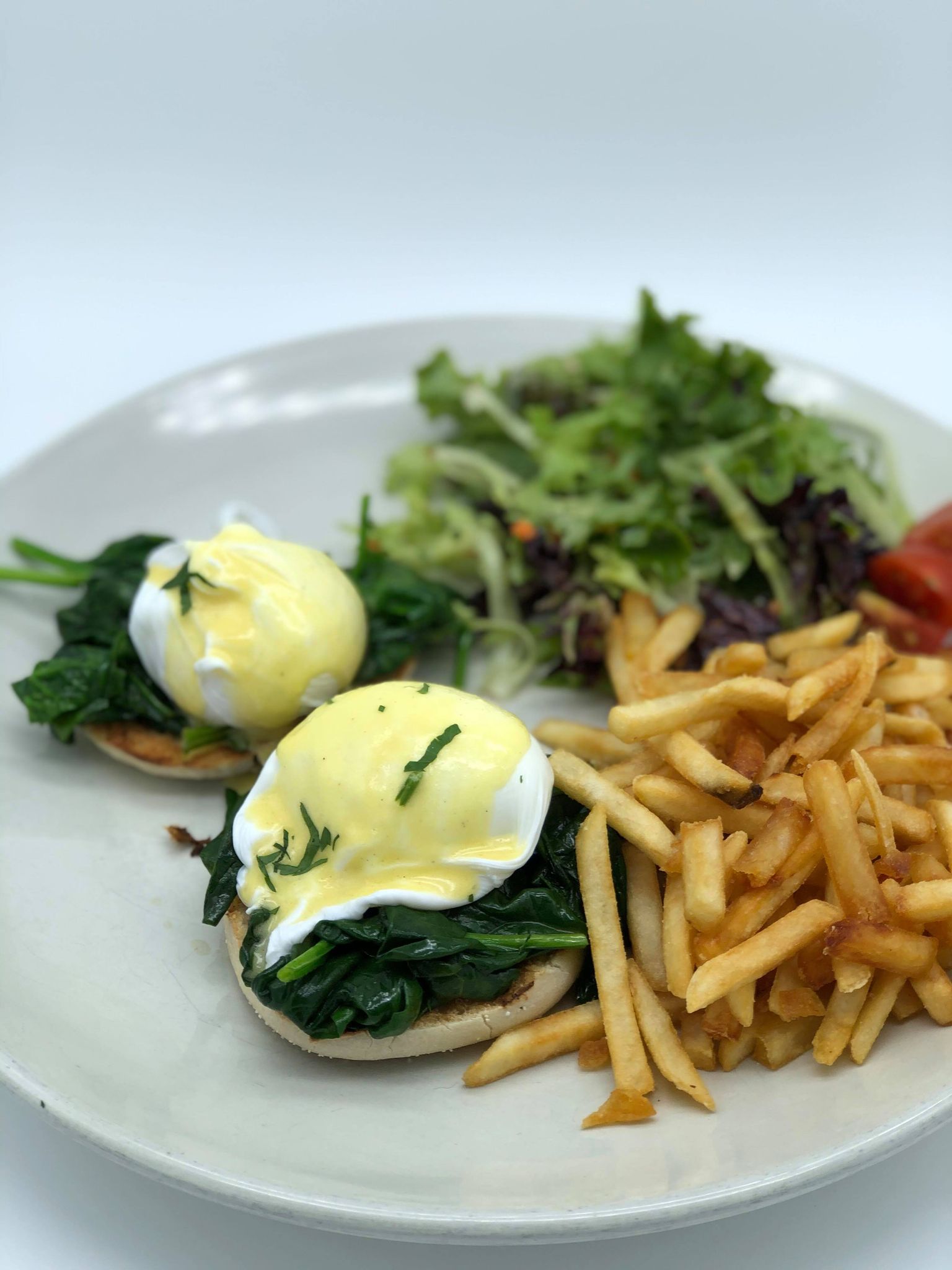 Order Sauteed Spinach Eggs Benedict food online from Petit Robert Bistro store, Boston on bringmethat.com