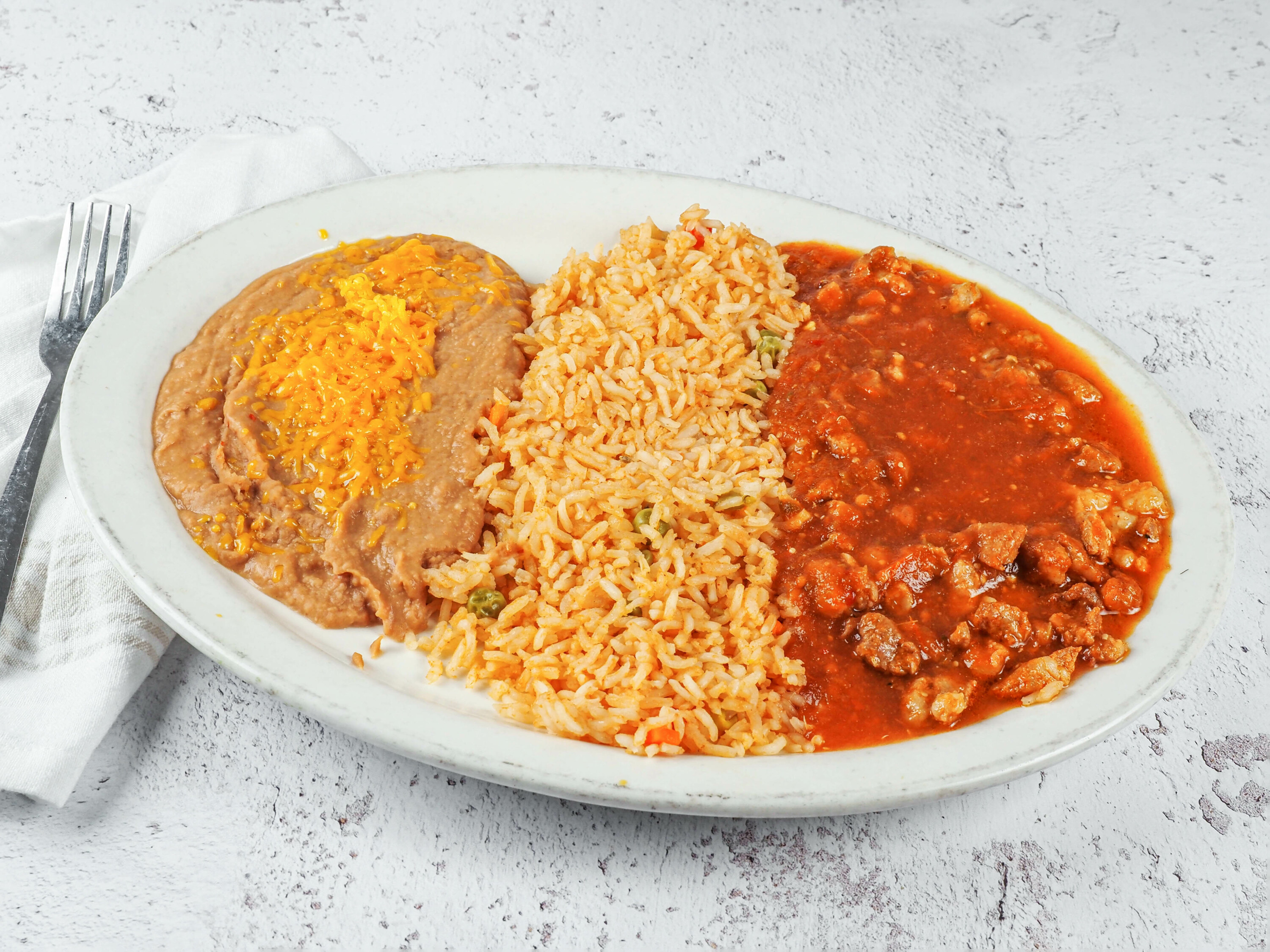 Order Guisado Rojo food online from Zapata Mexican Grill store, Oklahoma City on bringmethat.com