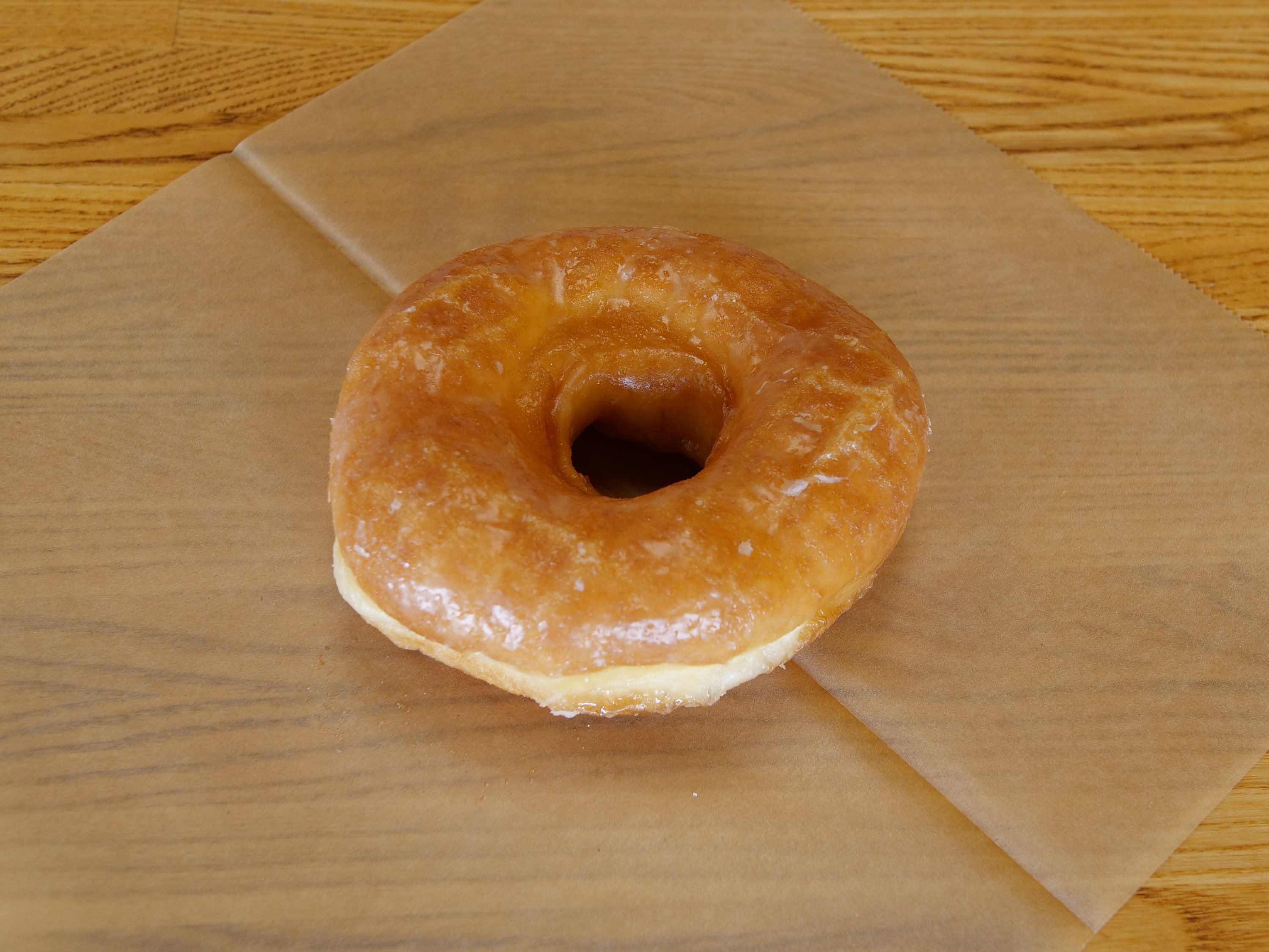 Order Maple Glazed Raised Donut food online from The Donut House store, Castle Rock on bringmethat.com