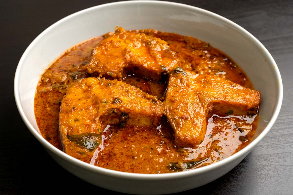 Order Fish Curry food online from Desi Chops store, Houston on bringmethat.com
