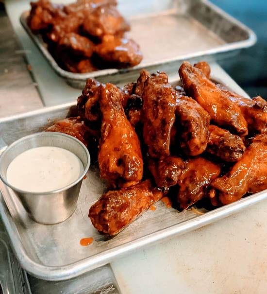 Order 50¢ Wing food online from Pizzeria Nomad store, Amarillo on bringmethat.com