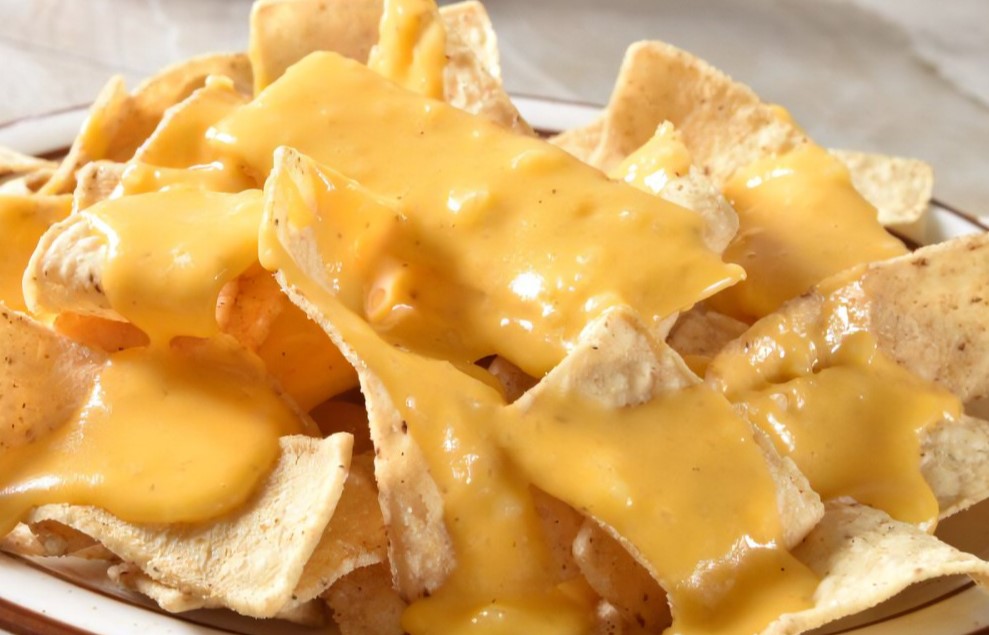 Order Side Cheezy Nacho food online from Janik's Cafe store, Chicago on bringmethat.com