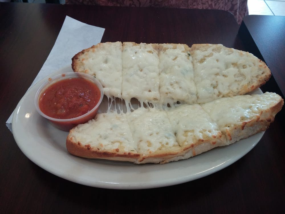 Order Garlic Cheese Bread - Appetizer food online from EJ's Italian Bistro store, Jacksonville on bringmethat.com