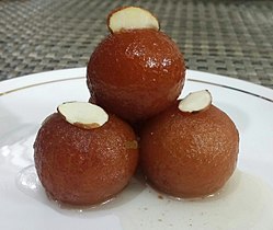 Order Gulab Jamoon (2pc) food online from Thalaiva's Indian Kitchen store, Park Ridge on bringmethat.com