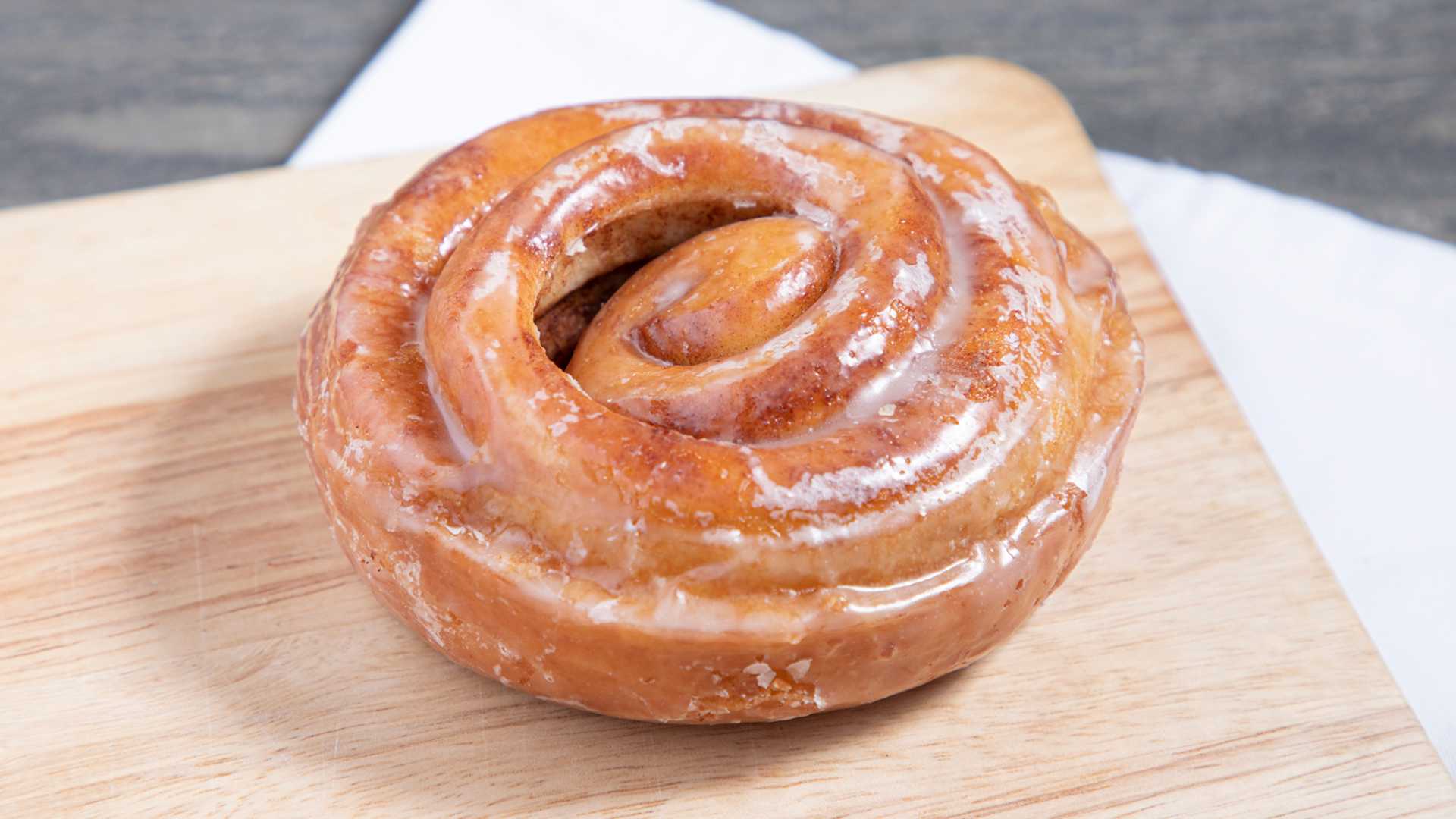 Order Cinnamon Roll Donut food online from Daylight Donuts store, Oklahoma City on bringmethat.com