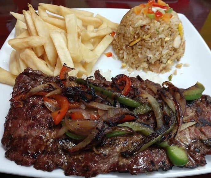Order Carne Asada food online from Panca Peruvian Resturant store, Nashville on bringmethat.com