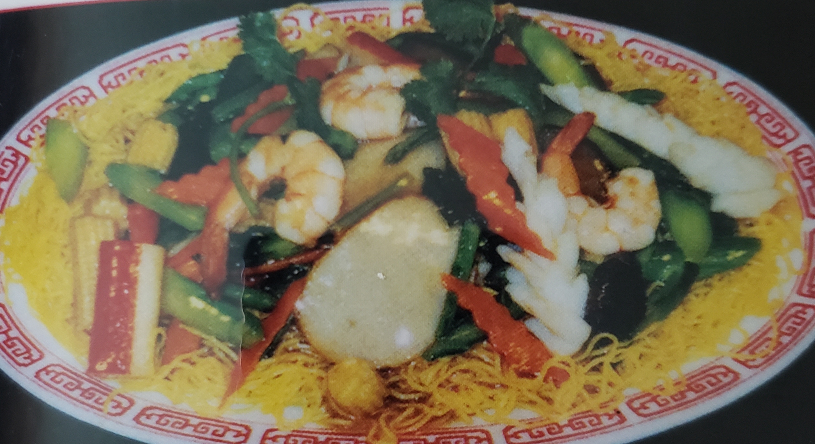 Order 28. Seafood Fried Yellow Noodle food online from Hak Heang Restaurant store, Long Beach on bringmethat.com