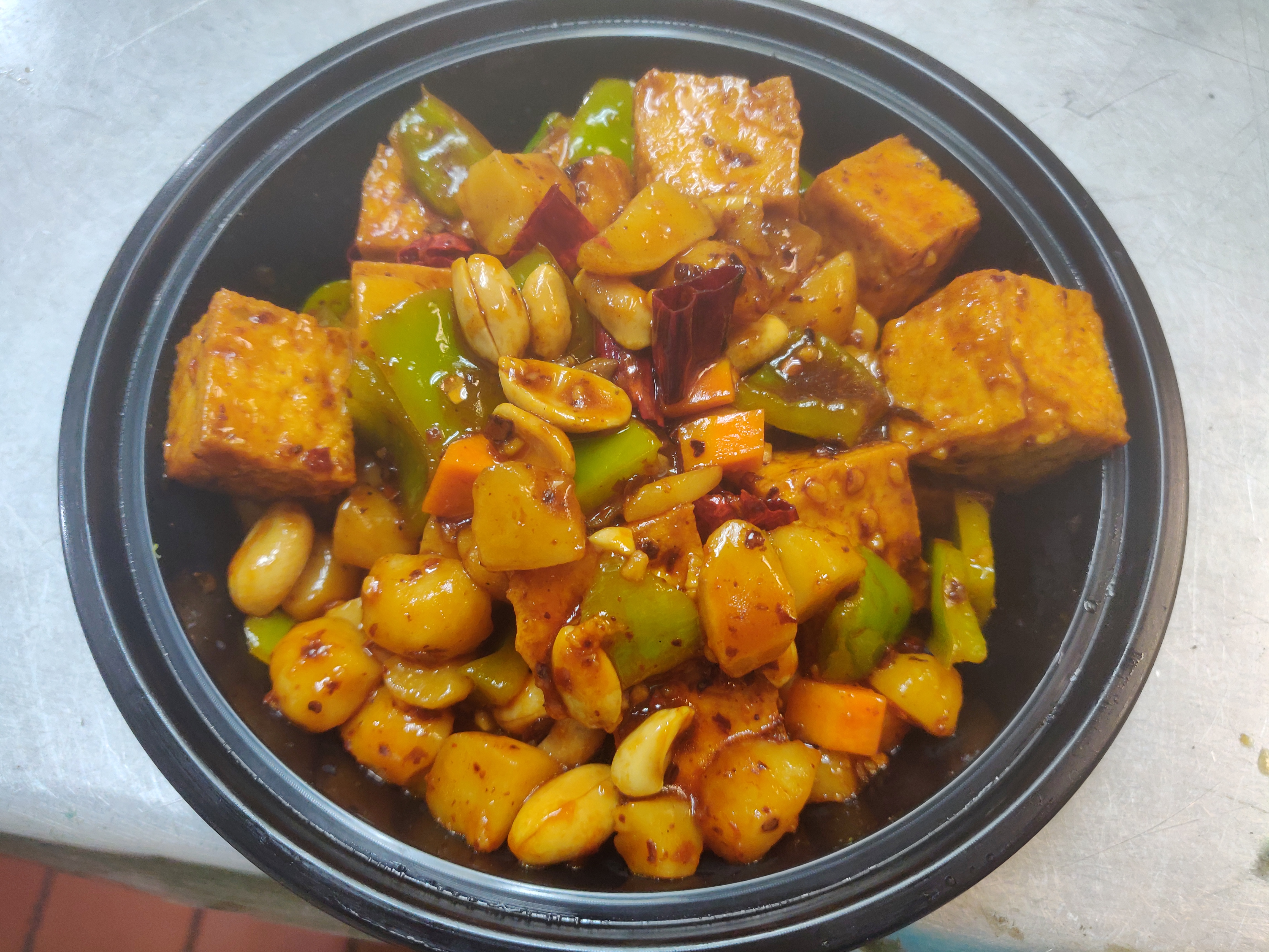 Order V6. Kung Po Tofu with Peanut food online from Sam Cafe store, Houston on bringmethat.com