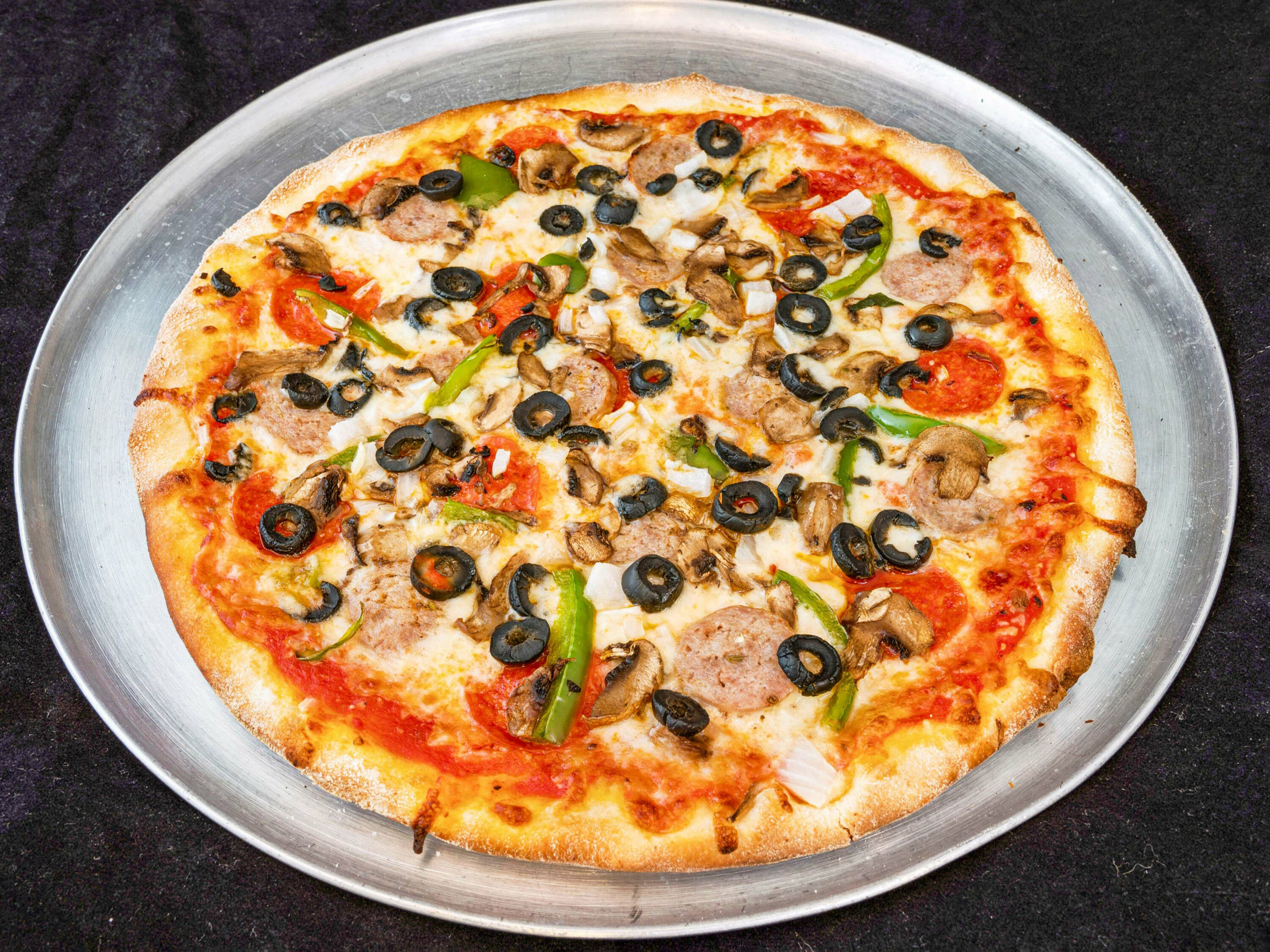 Order Special Pie food online from Bravo NY Pizza store, New Milford on bringmethat.com