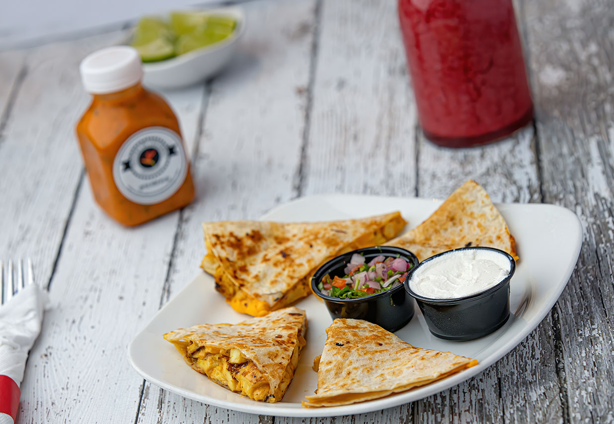 Order Noches Kids quesadilla with chicken food online from Noches De Colombia store, Randolph on bringmethat.com