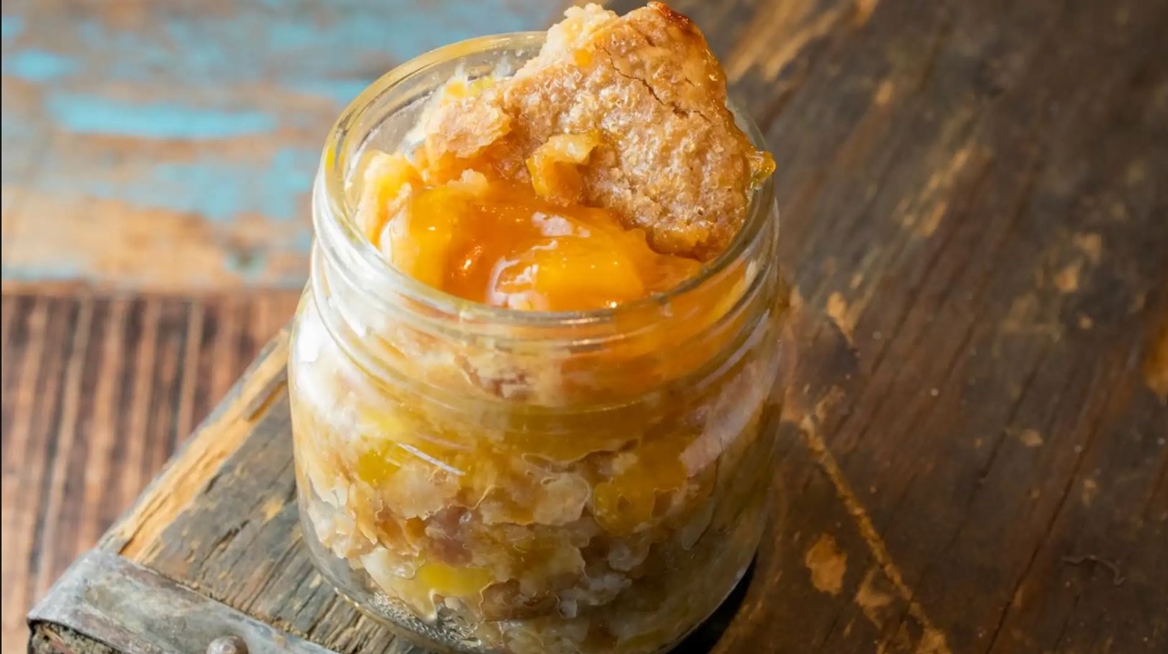 Order Peach Cobbler food online from Cousin Barbq store, Crowley on bringmethat.com