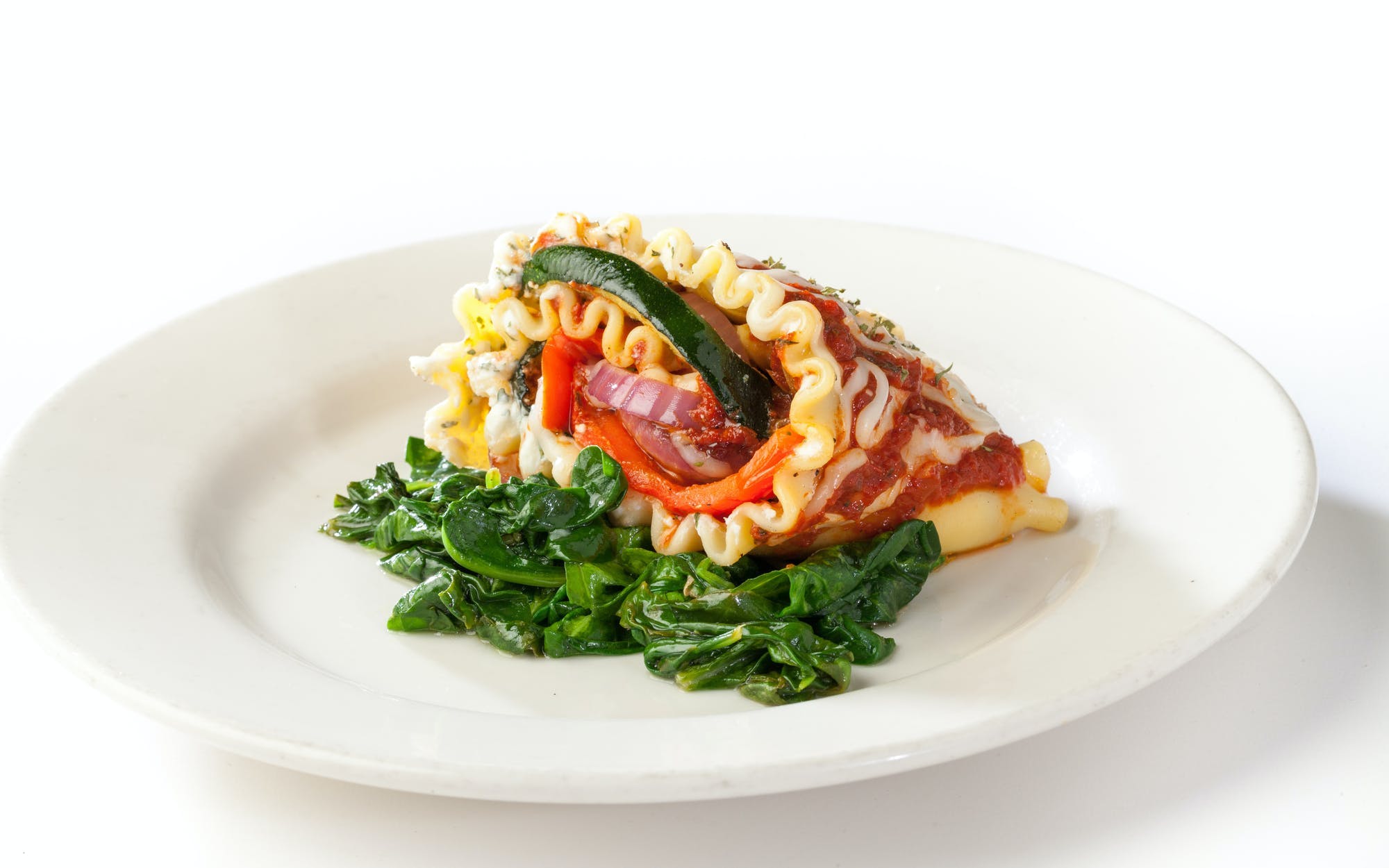 Order Roasted Vegetable Lasagna Roll Up - Pasta food online from Oggi Sports | Brewhouse | Pizza store, Mission Viejo on bringmethat.com
