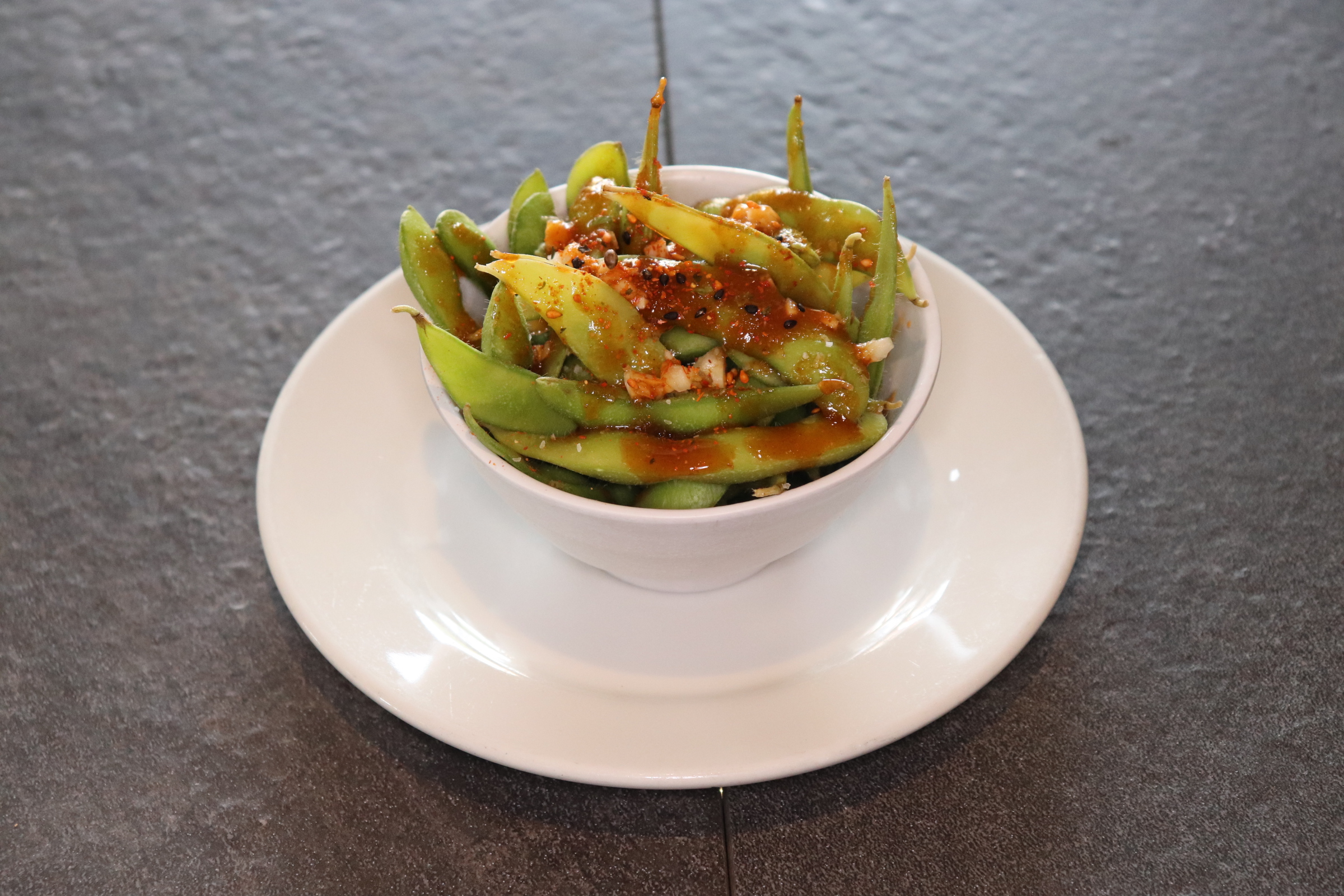 Order Spicy Edamame food online from Toshiko Japanese Cuisine store, Hanford on bringmethat.com