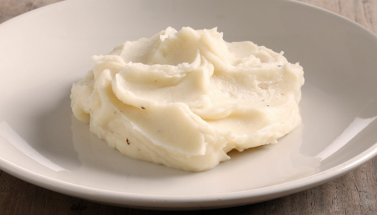 Order White Cheddar Mashed Potatoes food online from BJ's Restaurant & Brewhouse store, Pearland on bringmethat.com