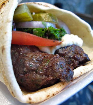 Order Kafta Kabab Sandwich food online from Nour Cafe store, Revere on bringmethat.com