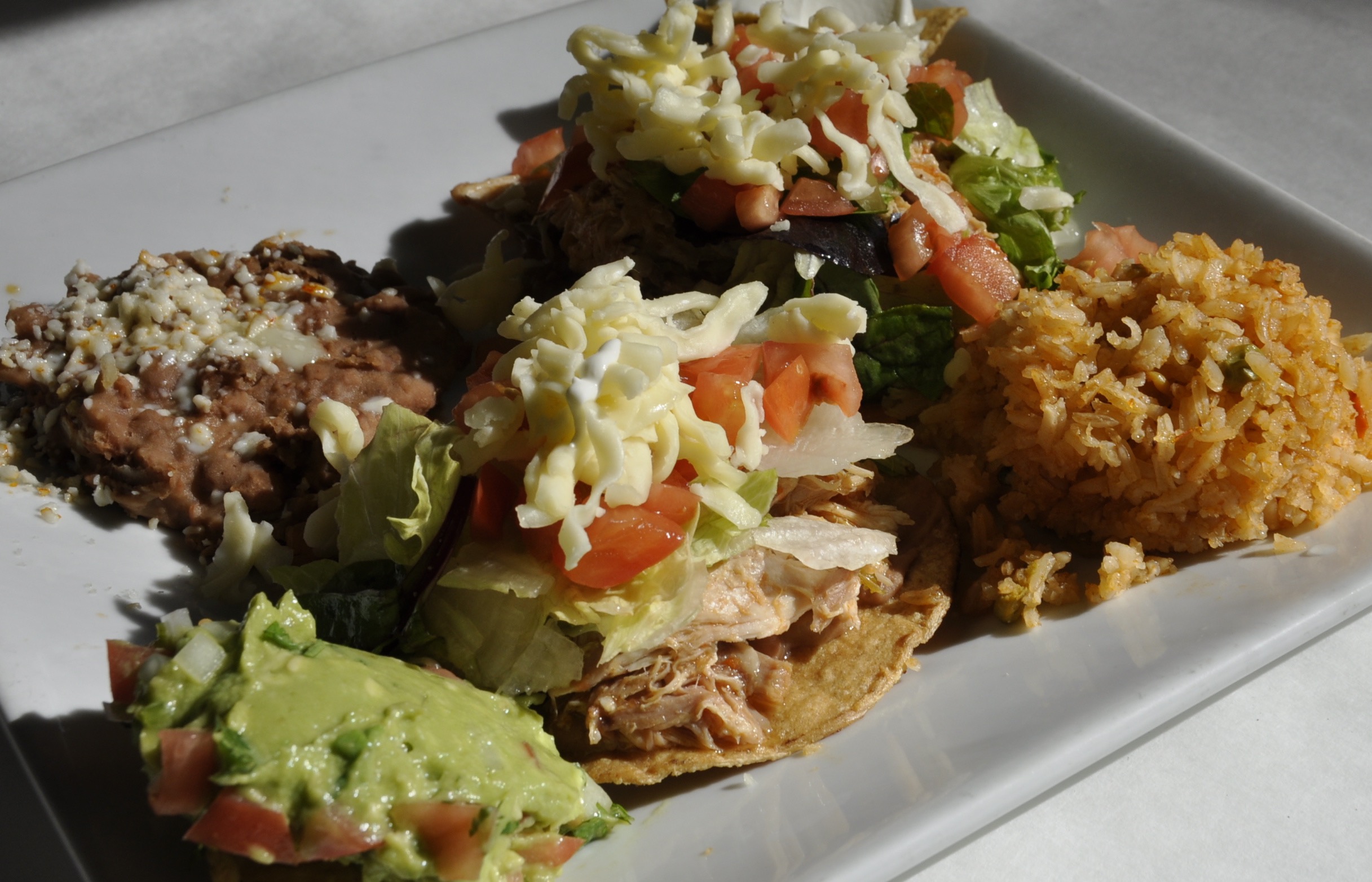Order Tostadas food online from El Nuevo Mexicano store, Roswell on bringmethat.com