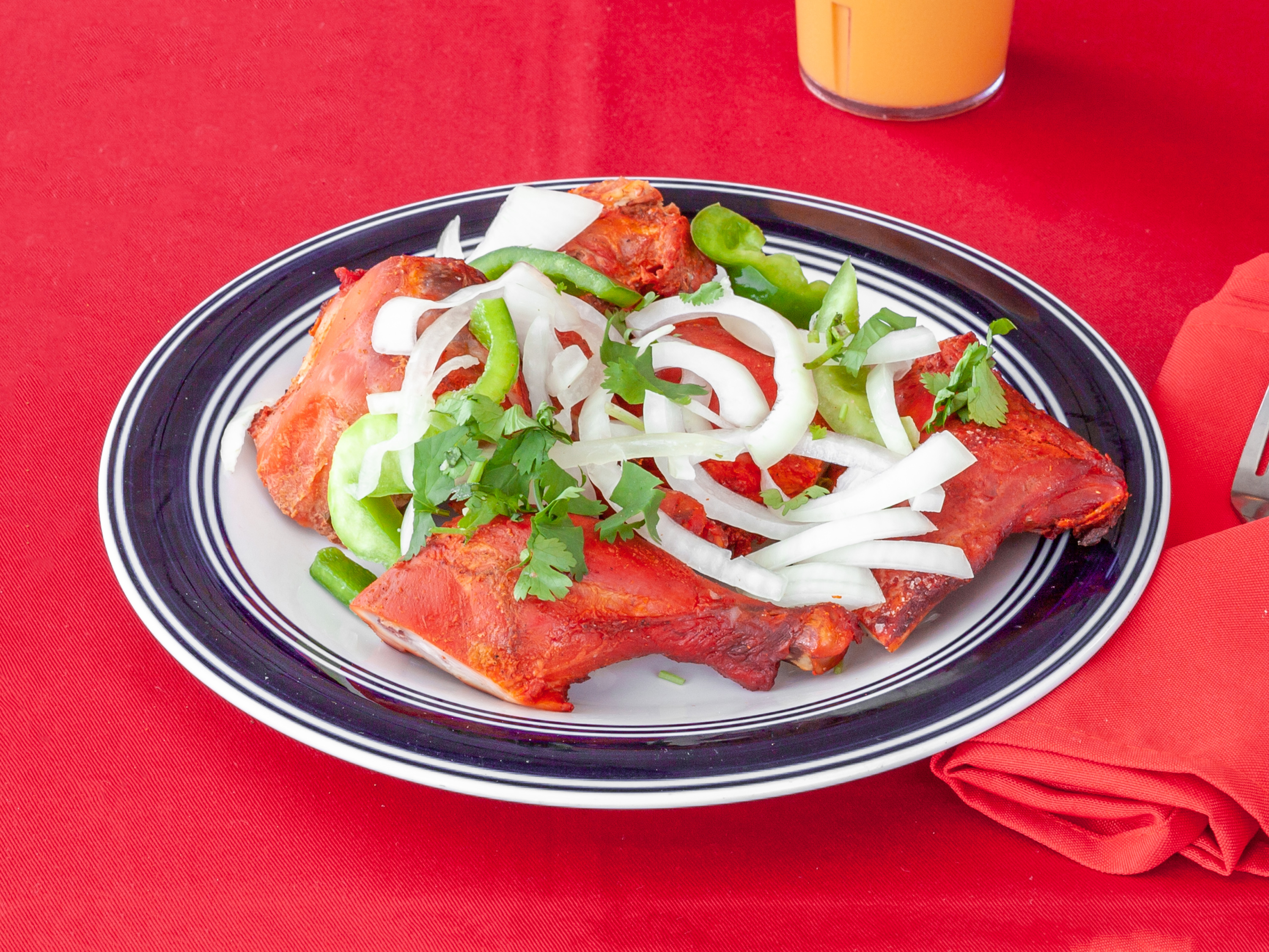 Order 92. Tandoori Chicken food online from Ambar Indian Restaurant store, Champaign on bringmethat.com