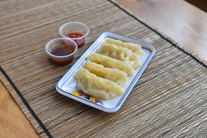 Order Steam Dumplings (8pcs) 蒸饺寧 food online from Fine China store, Lansing on bringmethat.com