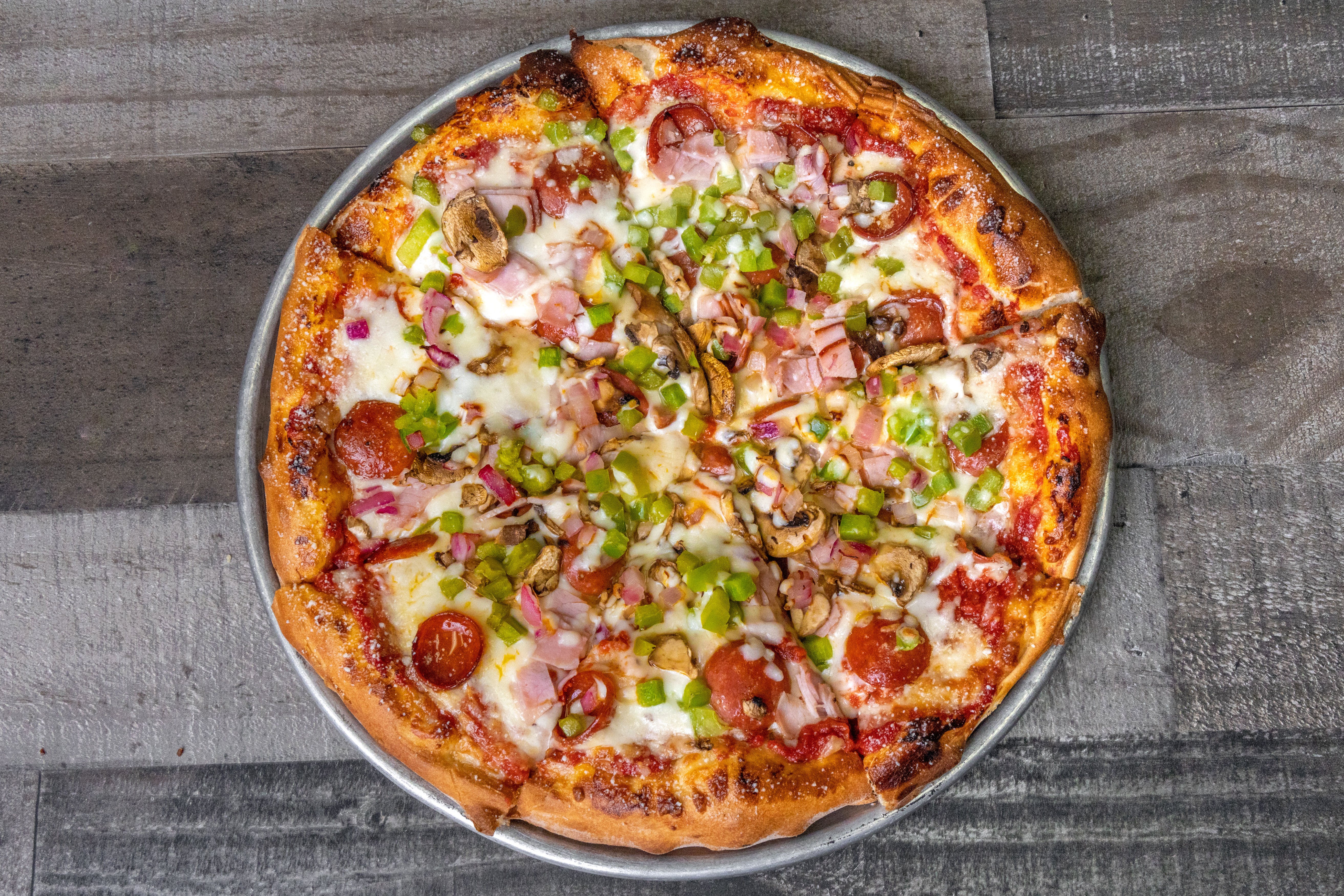 Order Supreme Pizza - Personal 8'' food online from Jimmy's Pub store, East Lansing on bringmethat.com