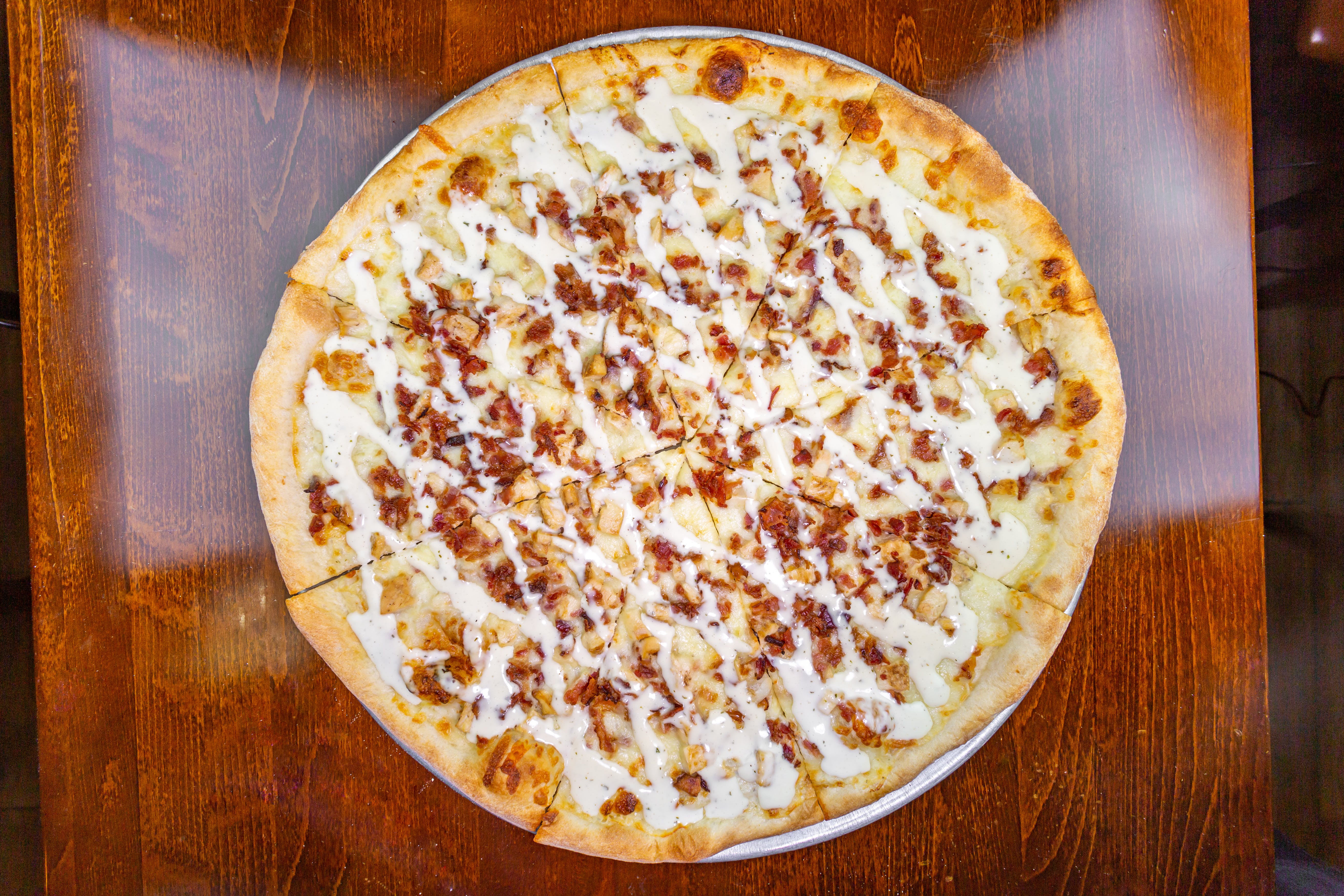 Order Chicken Bacon Ranch Pizza - Small 14'' food online from Zio's Pizza store, Allentown on bringmethat.com