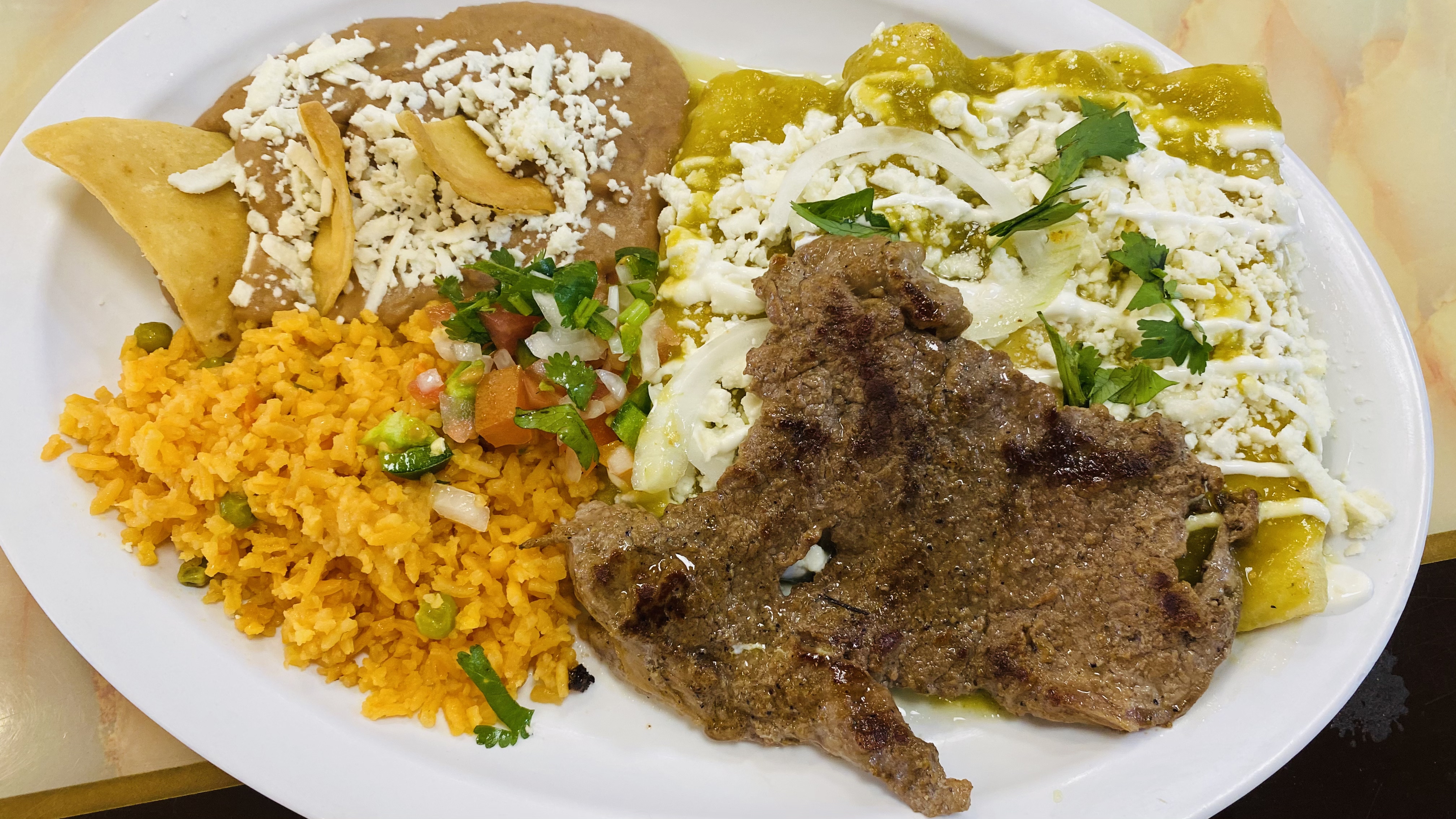 Order Enchiladas with beef steak  food online from Dona Tere Westheimer store, Houston on bringmethat.com