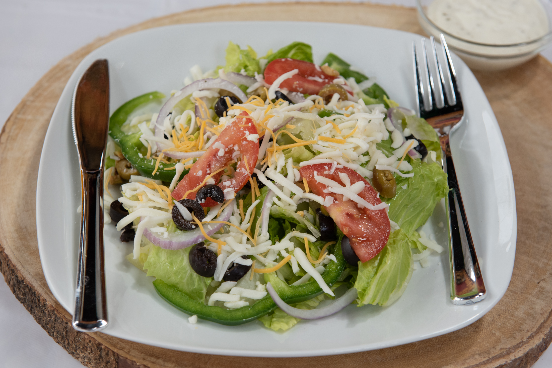 Order House Salad food online from Milanos Pizzeria store, Nashville on bringmethat.com