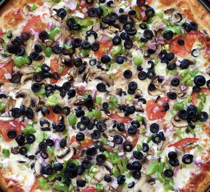 Order Veggie Lovers Pizza food online from Dino's store, Albany on bringmethat.com