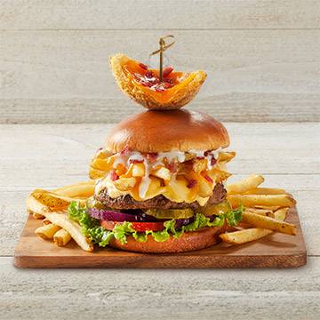 Order Loaded Cheese Fry Burger food online from TGI Fridays store, Greenville on bringmethat.com