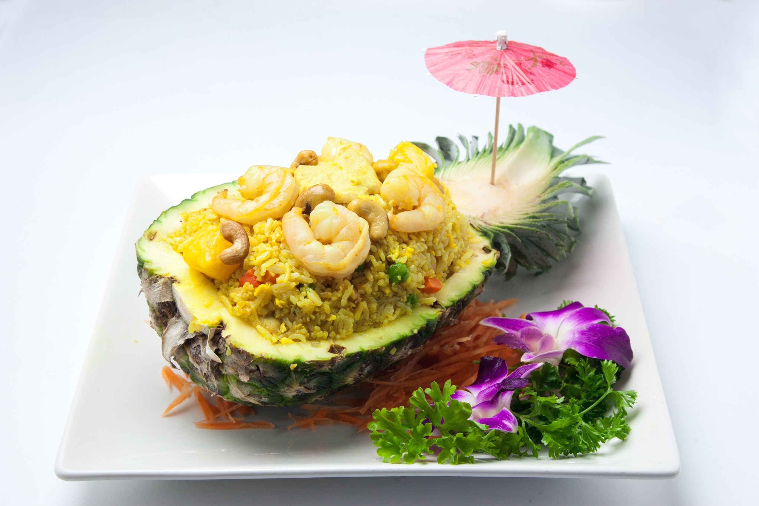 Order Pineapple Fried Rice food online from Basil Thai Bistro store, San Diego on bringmethat.com