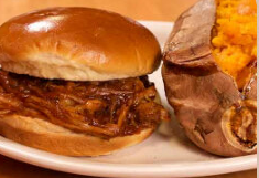 Order BBQ Pulled Pork Sandwich food online from Texas Corral store, Kalamazoo on bringmethat.com