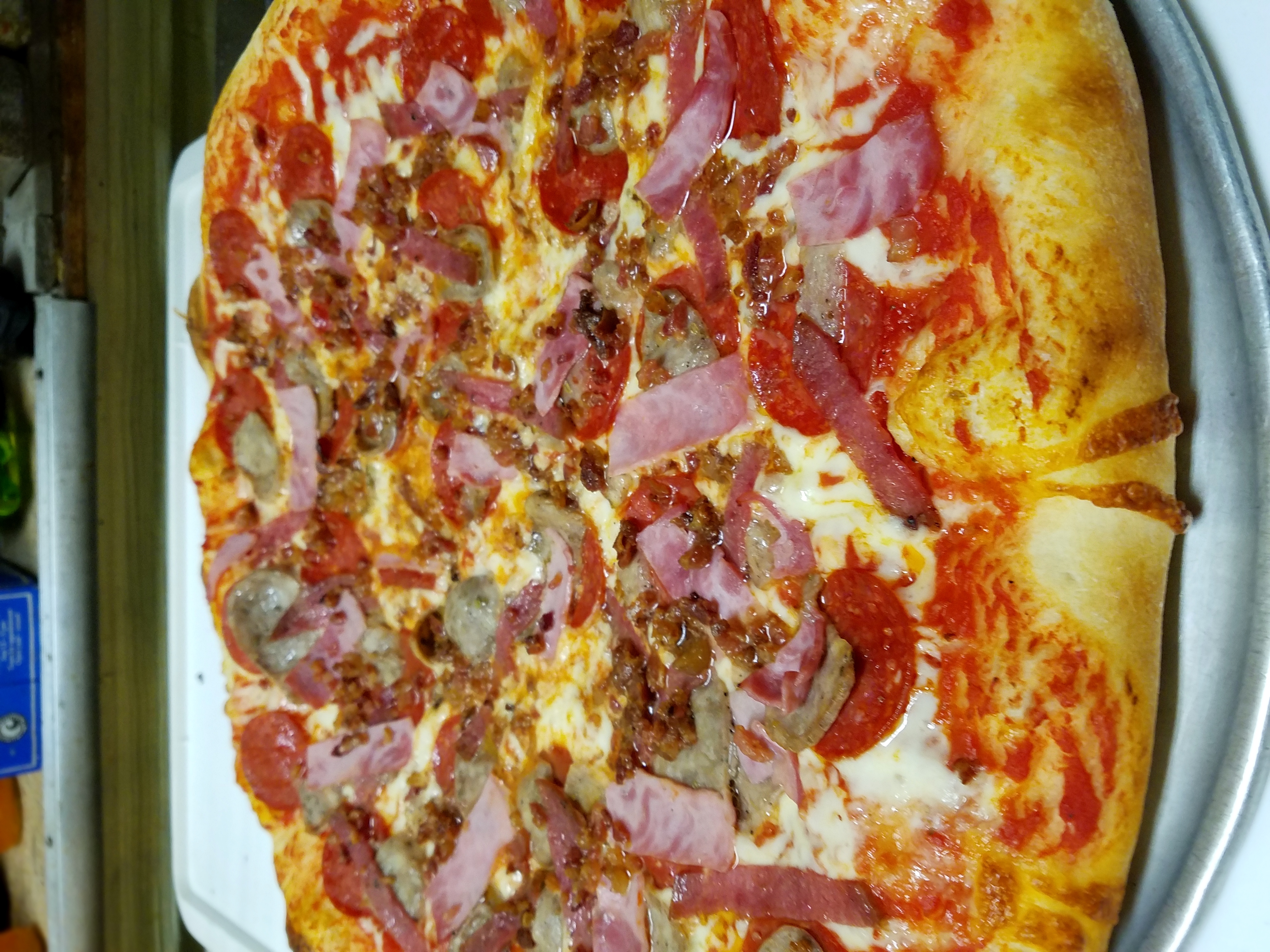 Order Meat Lovers Pizza food online from Nino's Pizza store, Boston on bringmethat.com