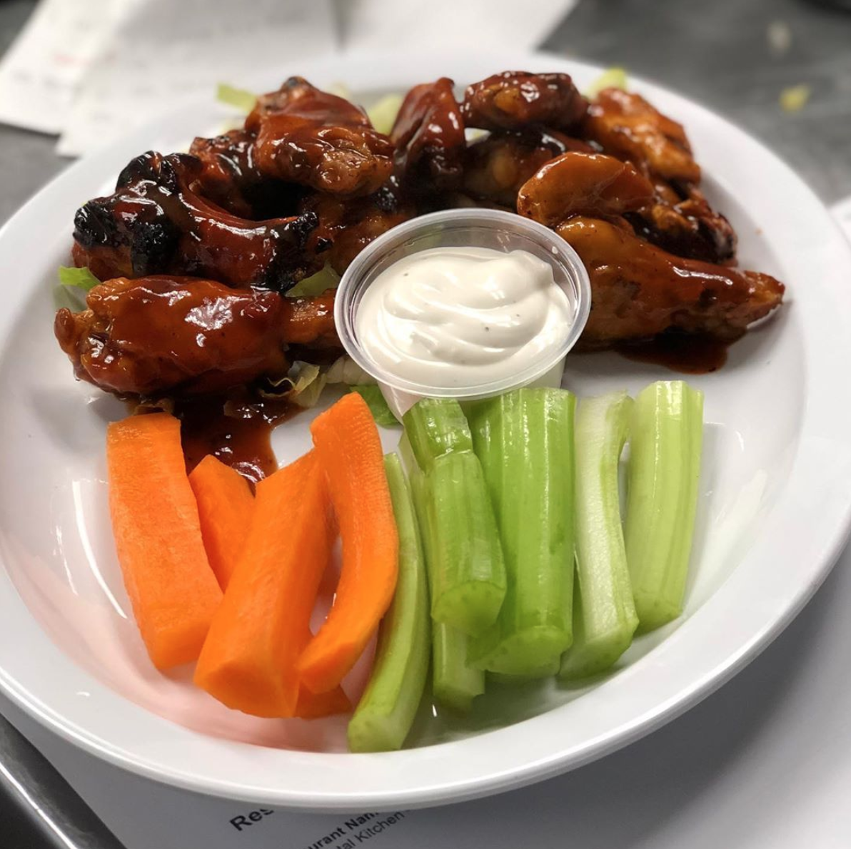 Order 10 Piece Hot and Spicy Wings food online from Continental Kitchen - Beverly Hills store, Beverly Hills on bringmethat.com