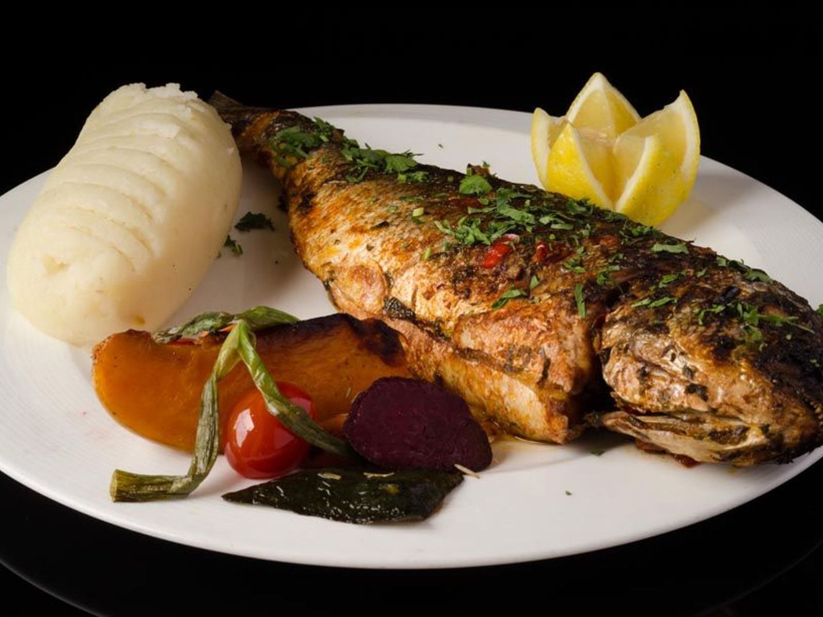 Order Whole Oven Baked Branzino/Denise food online from cafe muscat store, Fresh Meadows on bringmethat.com