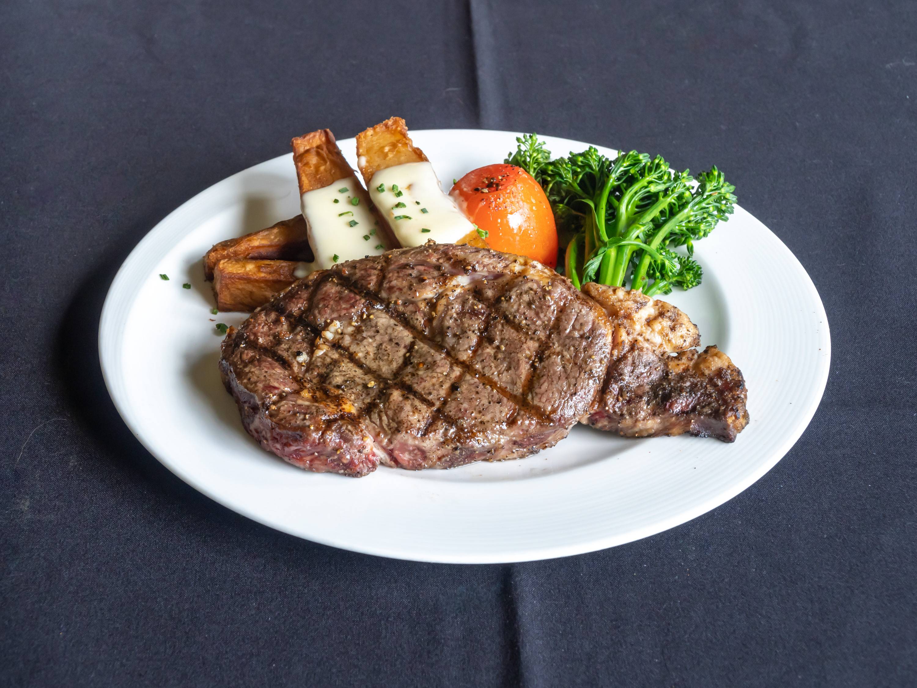 Order Charbroiled Ribeye Steak food online from Red Restaurant & Bar store, City of Industry on bringmethat.com