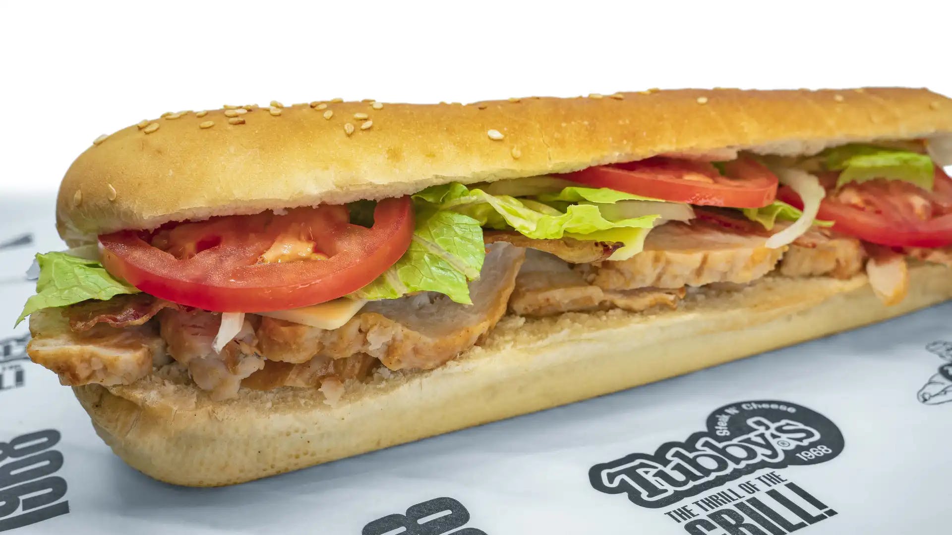 Order Turkey Club Sub - Small food online from Tubby's Grilled Submarines store, Westland on bringmethat.com