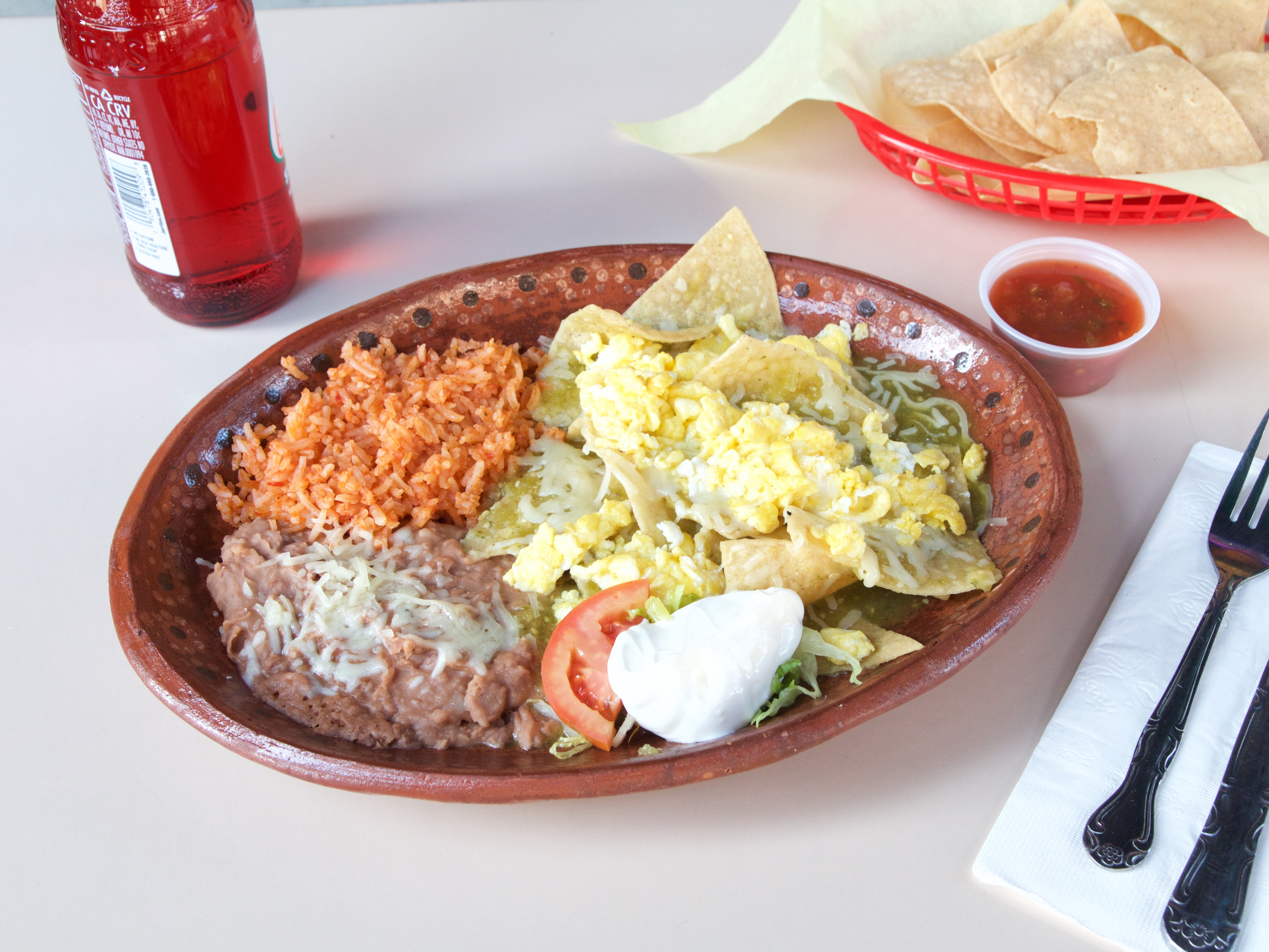 Order 5. Chilaquiles con Huevos Plate food online from Taqueria Cardenas store, Modesto on bringmethat.com