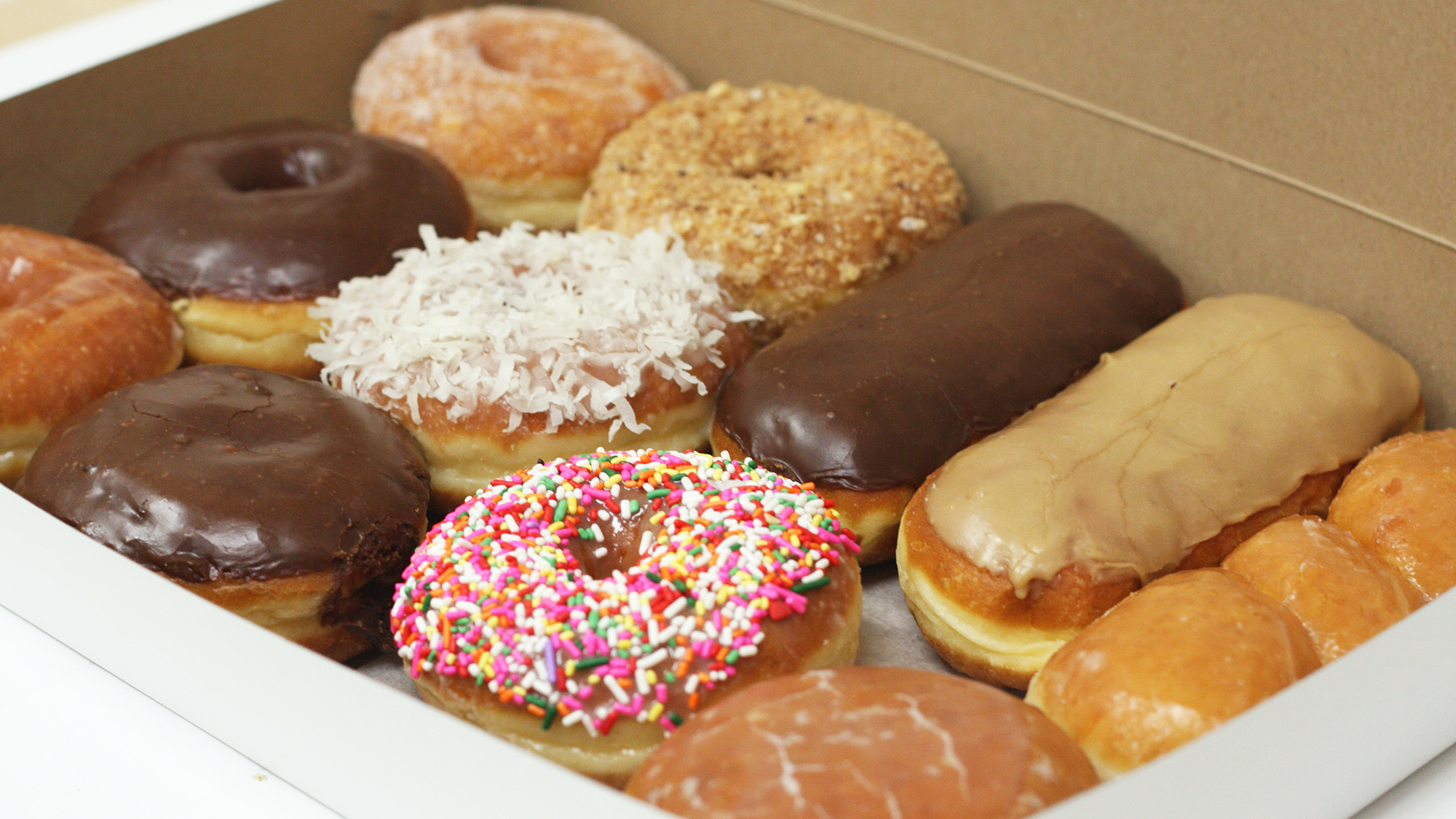 Order Dozen Mixed Donuts food online from Rainbow Donuts store, Norwalk on bringmethat.com